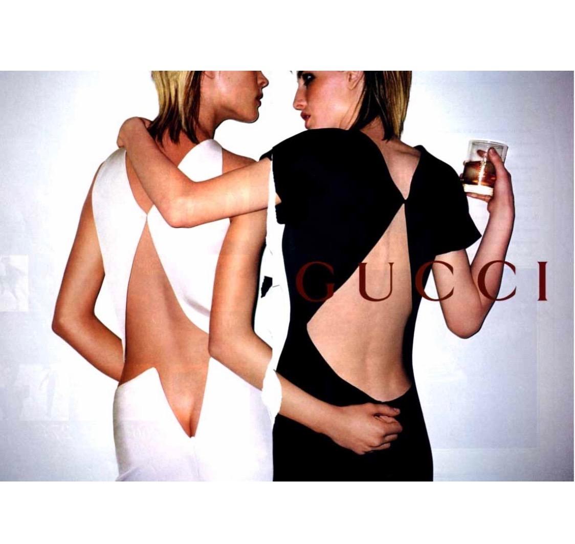 Presenting a chic black silk two-piece skirt set designed by Tom Ford for Gucci's Fall/Winter 2001 collection. This piece debuted on the runway as look number 31 in white on Omahyra Mota and in the ad campaign on Erin Wasson, shot by Terry