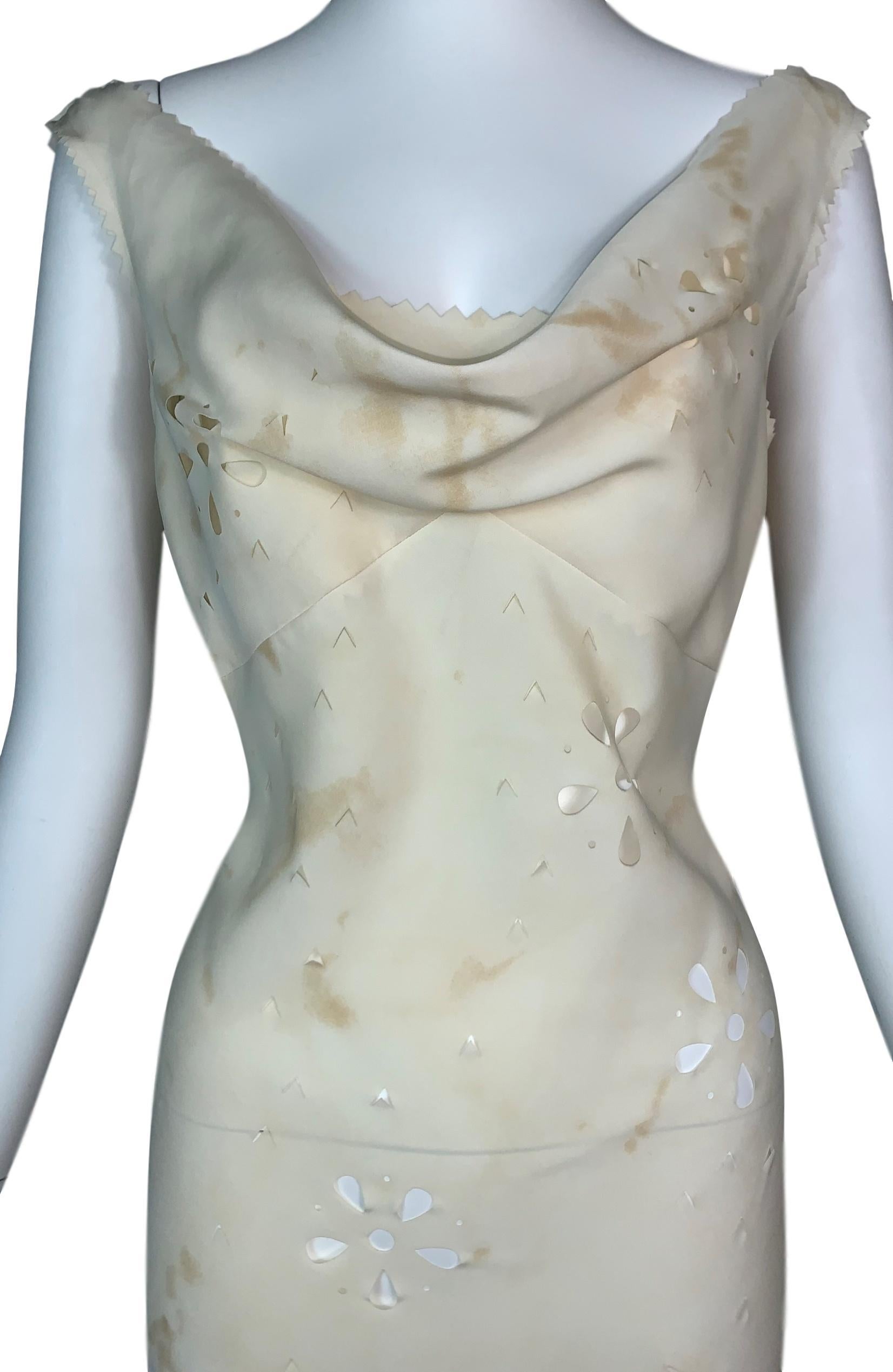 DESIGNER: F/W 2001 John Galliano- slip on- no zipper closure- shown on the runway look #36, he folded down the top of the dress.

Please contact for more information and/or photos.

CONDITION: Good- light wear at hem- see last photo

MATERIAL: