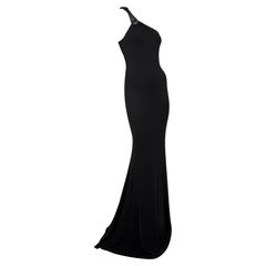 A/I 2001 Michael Kors fa sfilare l'abito con cinturino asimmetrico in pelle nera come campione del Bodycon