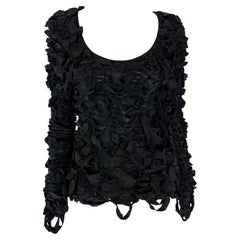 Pull en tricot à rubans noirs Yves Saint Laurent par Tom Ford, A/H 2001
