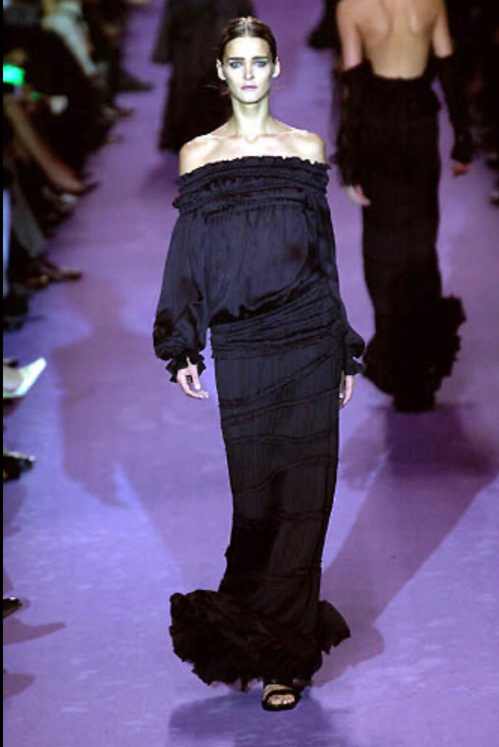 Presenting a fabulous black pheasant-style Yves Saint Laurent Rive Gauche top, designed by Tom Ford. From the Fall/Winter 2001 collection, this top debuted as part of look 20 modeled by Caroline Ribeiro and was also highlighted in the season's ad