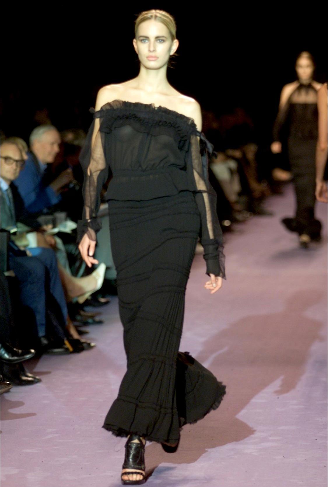 Presenting a luxurious ruffle-trimmed maxi skirt designed by Tom Ford for Yves Saint Laurent Rive Gauche's Fall/Winter 2001 collection. This skirt debuted as part of Look 42 on Karolina Kurkova, and a blue version was featured on the September 2001