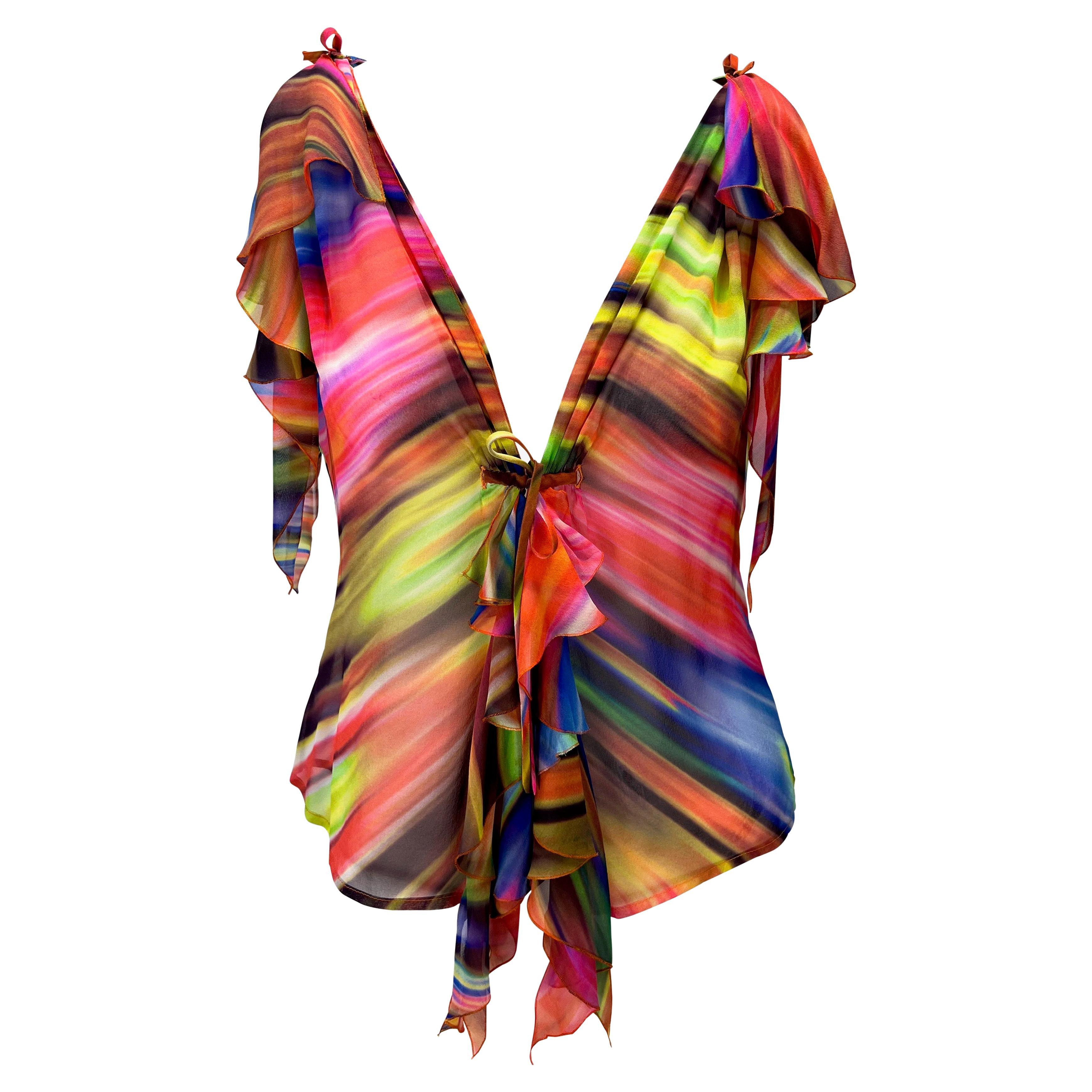 Presenting a stunning multicolor Gianni Versace Couture top, designed by Donatella Versace. From the Fall/Winter 2002 collection, this fabulous lightweight silk top is covered in an abstract psychedelic pattern and features flowy accents at the