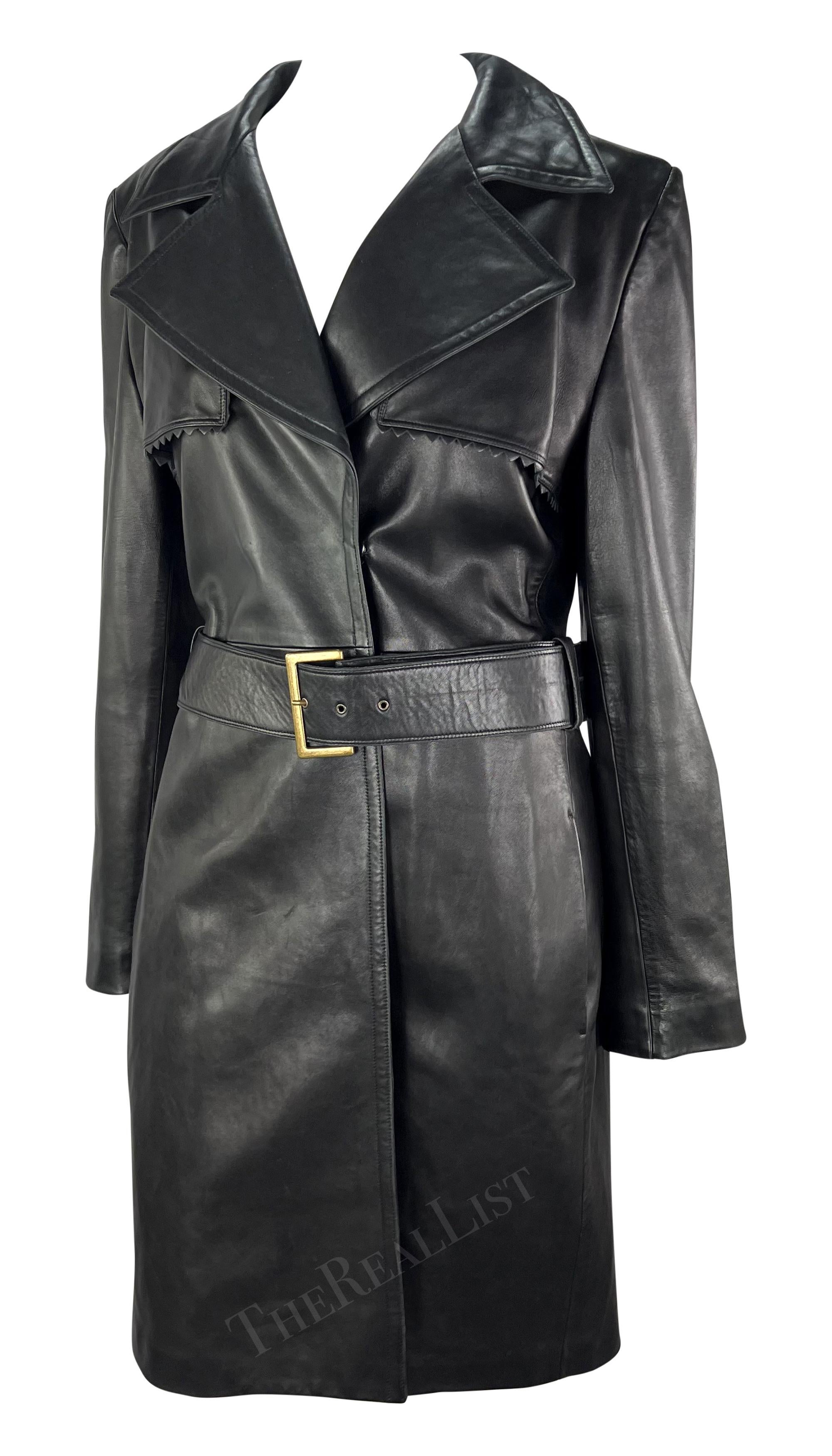 From the Fall/Winter 2002 collection, this Gianni Versace coat, designed by Donatella Versace, is constructed entirely of black leather. Unique saw-tooth shaped leather trim makes this a stand out coat. A must-have closet essential, this luxurious
