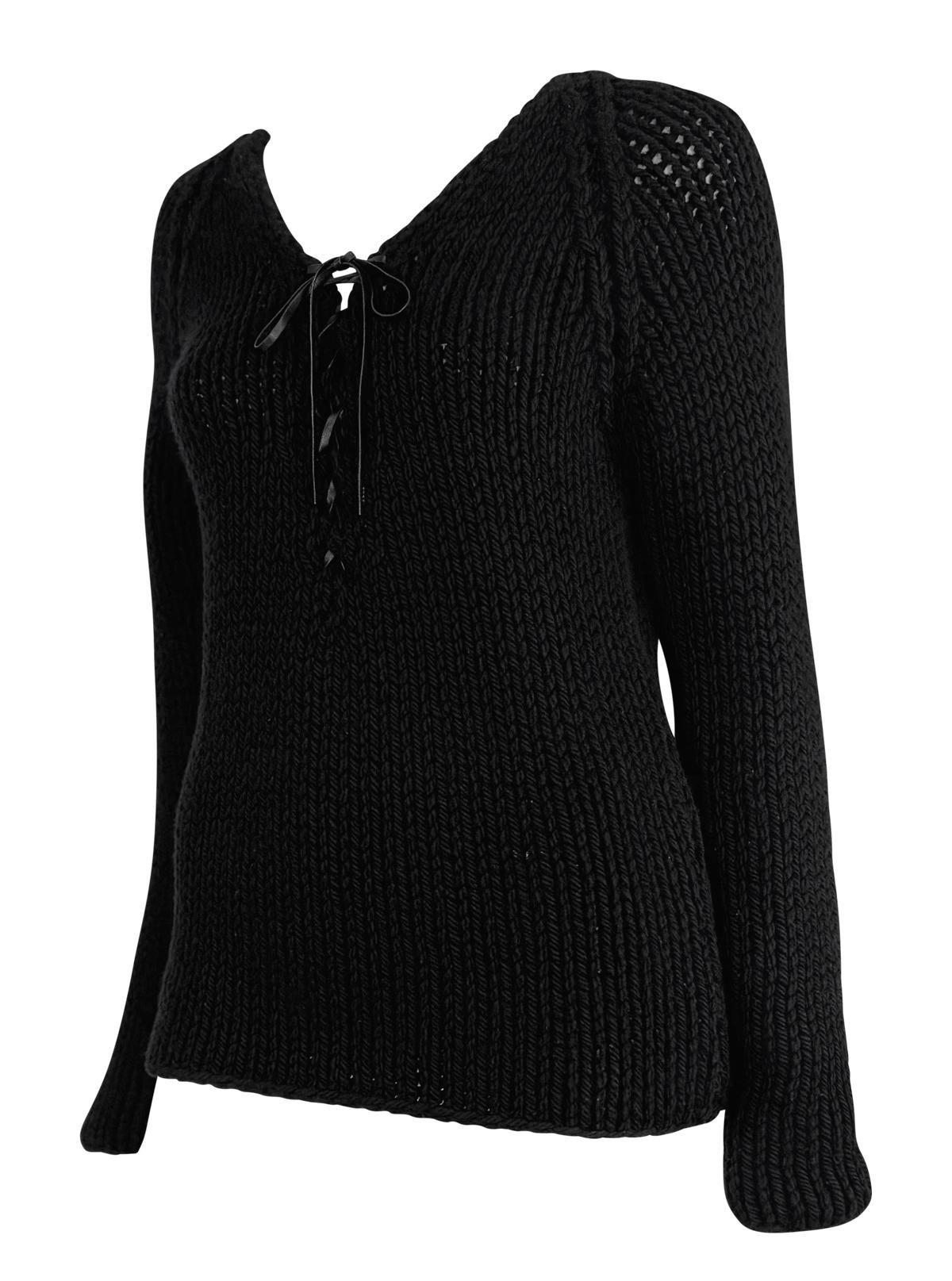 From Gucci’s Fall/Winter 2002 collection by Tom Ford, this black cashmere sweater features a lace-up leather tie detail at the neckline. The semi-sheer effect of the chunky knit construction and deep-plunging neckline give this piece a sexy edge