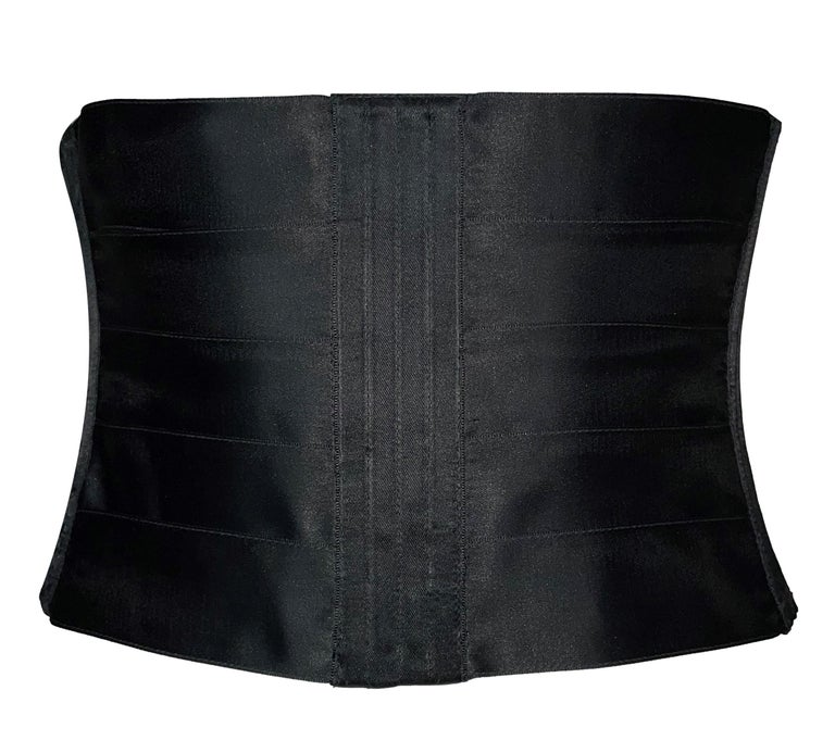 DESIGNER: F/W 2002 Gucci by Tom Ford- most looks shown on this runway had one of these corset belts

Please contact us for more images and/or information.

CONDITION: Good- no flaws

FABRIC: 100% polyester

COUNTRY: Italy

SIZE: 40 but it is