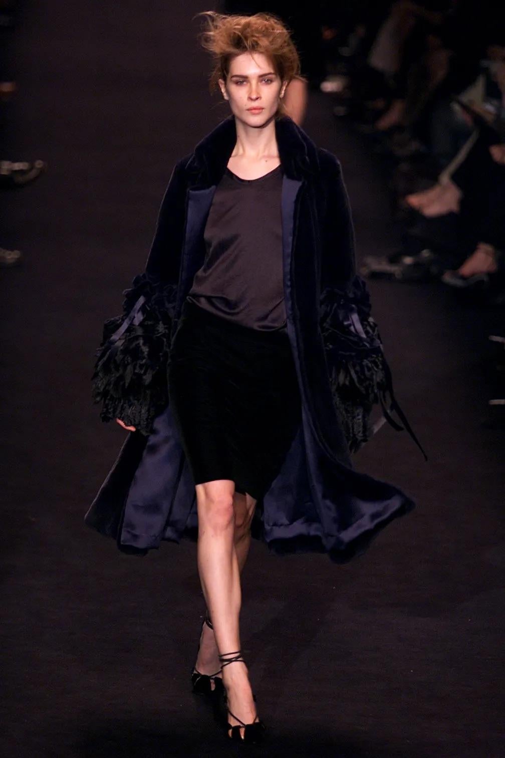 Presenting an incredible black Yves Saint Laurent Rive Gauche fur jacket, designed by Tom Ford. From the Fall/Winter 2002 collection, the full-length version of this coat debuted on the season's runway in navy as part of look 29, modeled by Erin