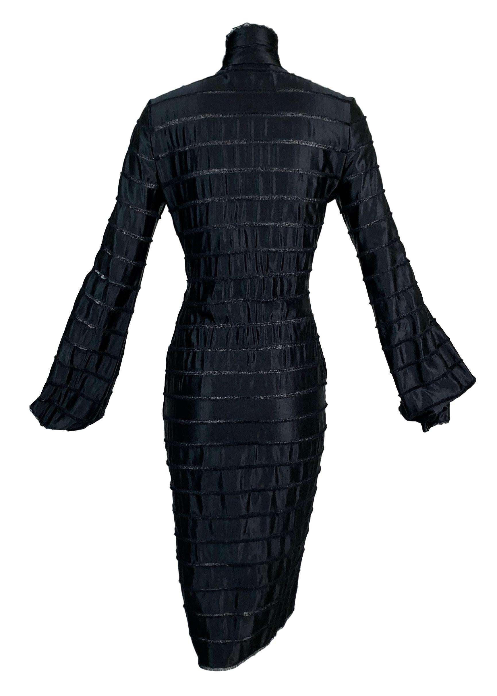 DESIGNER: F/W 2002 Yves Saint Laurent by Tom Ford

Please contact for more information and/or photos.

CONDITION: Good- no flaws

FABRIC: Unknown- bottom layer is a mesh with what feels like silk ribbons layered on top. 

COUNTRY MADE: France

SIZE: