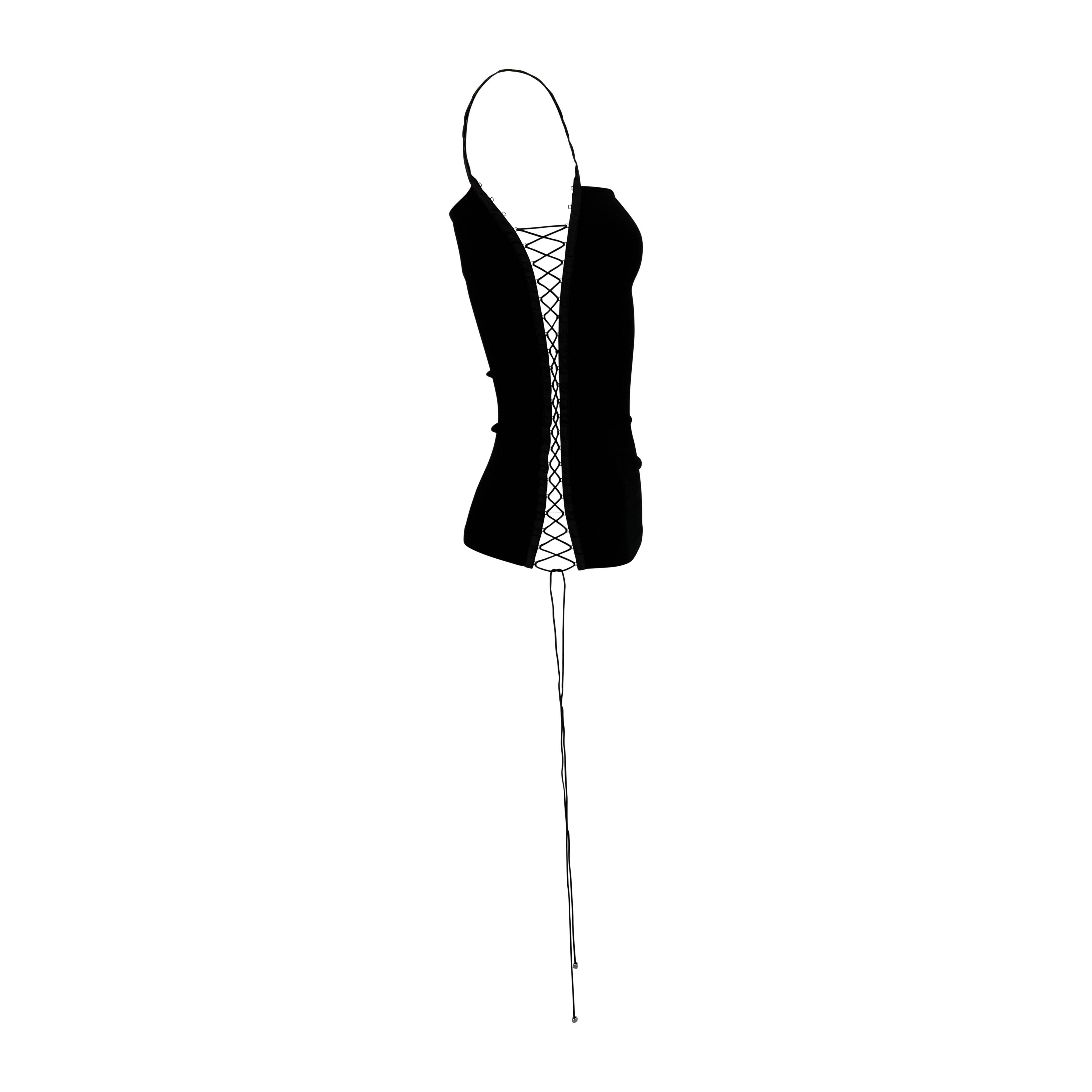 From Dolce & Gabbana’s Fall/Winter 2003 collection, this black stretch tank top features a sleek, body-hugging silhouette with dramatic lace-up sides. 

Approximate measurements:
Size - 42IT
Bust: 25 - 32