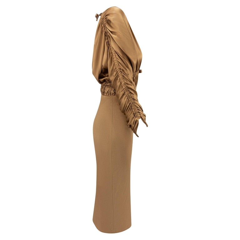 beyonce long sleeve dress Every year on January 26, I take a moment to reflect on the iconic moment when Beyonc wore my dress to the 56th Annual Grammy Awards in 2014. Many may know that