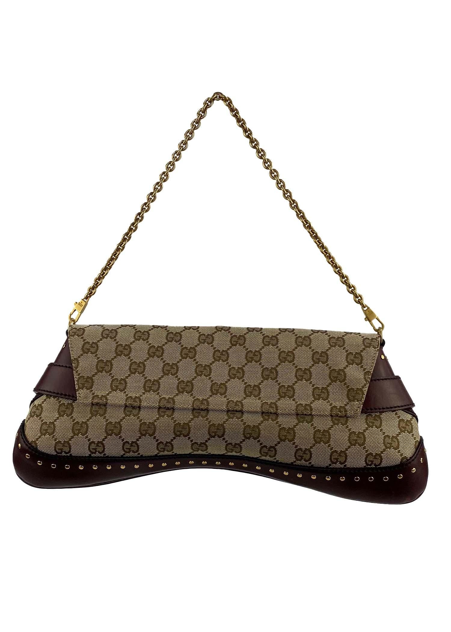 TheRealList presents: Designed by Tom Ford during his tenure at the house of Gucci, this bag represents Tom's interpretation of many of Gucci's classic elements, the most prominent being the large horse-bit. This large evening convertible bag is
