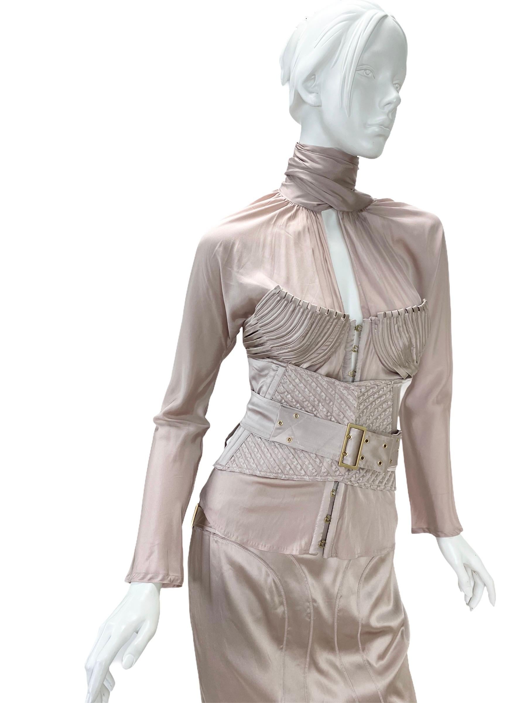 F/W 2003 Tom Ford for Gucci

Silk suit with corset belt

Unique, Rare and Highly Collectible! As seen on Gwen in her video 