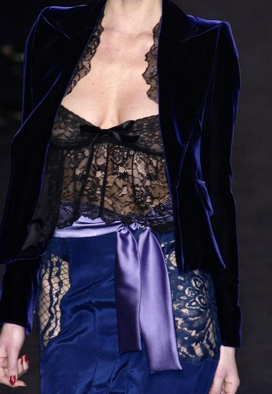 Presenting a fabulous sheer lace Yves Saint Laurent Rive Gauche top and skirt set, designed by Tom Ford. From the Fall/Winter 2003 Diana Ross inspired collection, these pieces debuted on the season's runway together worn as part of look 7, modeled