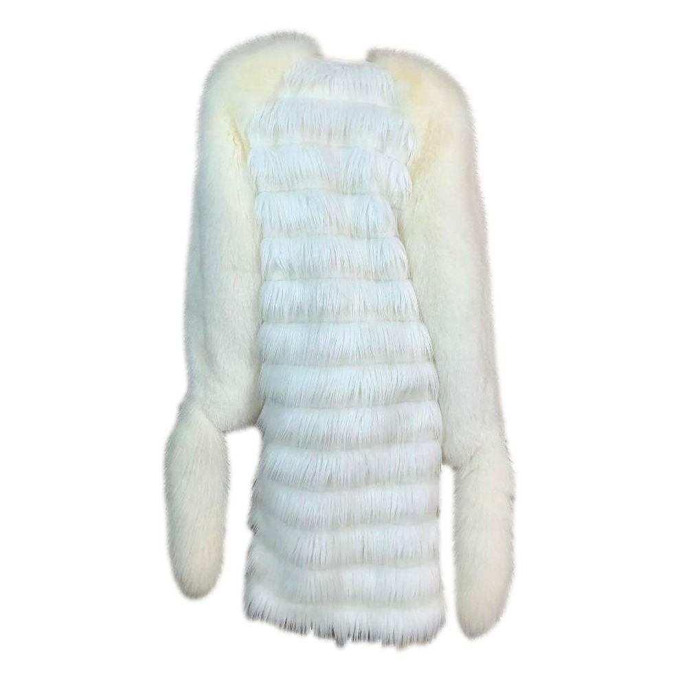 DESIGNER: F/W 2003 Yves Saint Laurent by Tom Ford

Please contact for more information and/or photos.

CONDITION: Good- flawless!

FABRIC: Faux fur blend with fox fur sleeves. 

COUNTRY MADE: France

SIZE: 40

MEASUREMENTS; provided as a courtesy