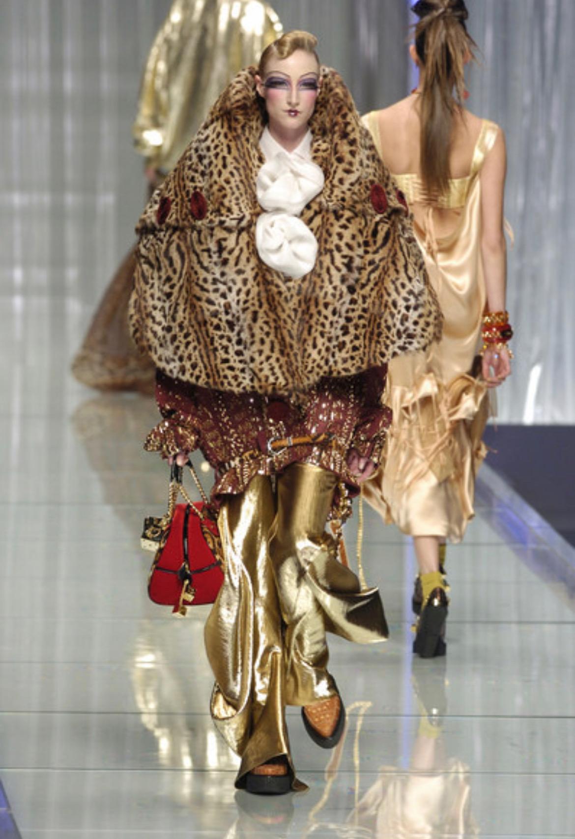 Presenting a stunning cheetah print rabbit fur Christian Dior Boutique oversized coat, designed by John Galliano. From the Fall/Winter 2004 'gambler' collection, the cheetah printed fur debuted on look number 33 on Jade Parfitt. This beautiful and
