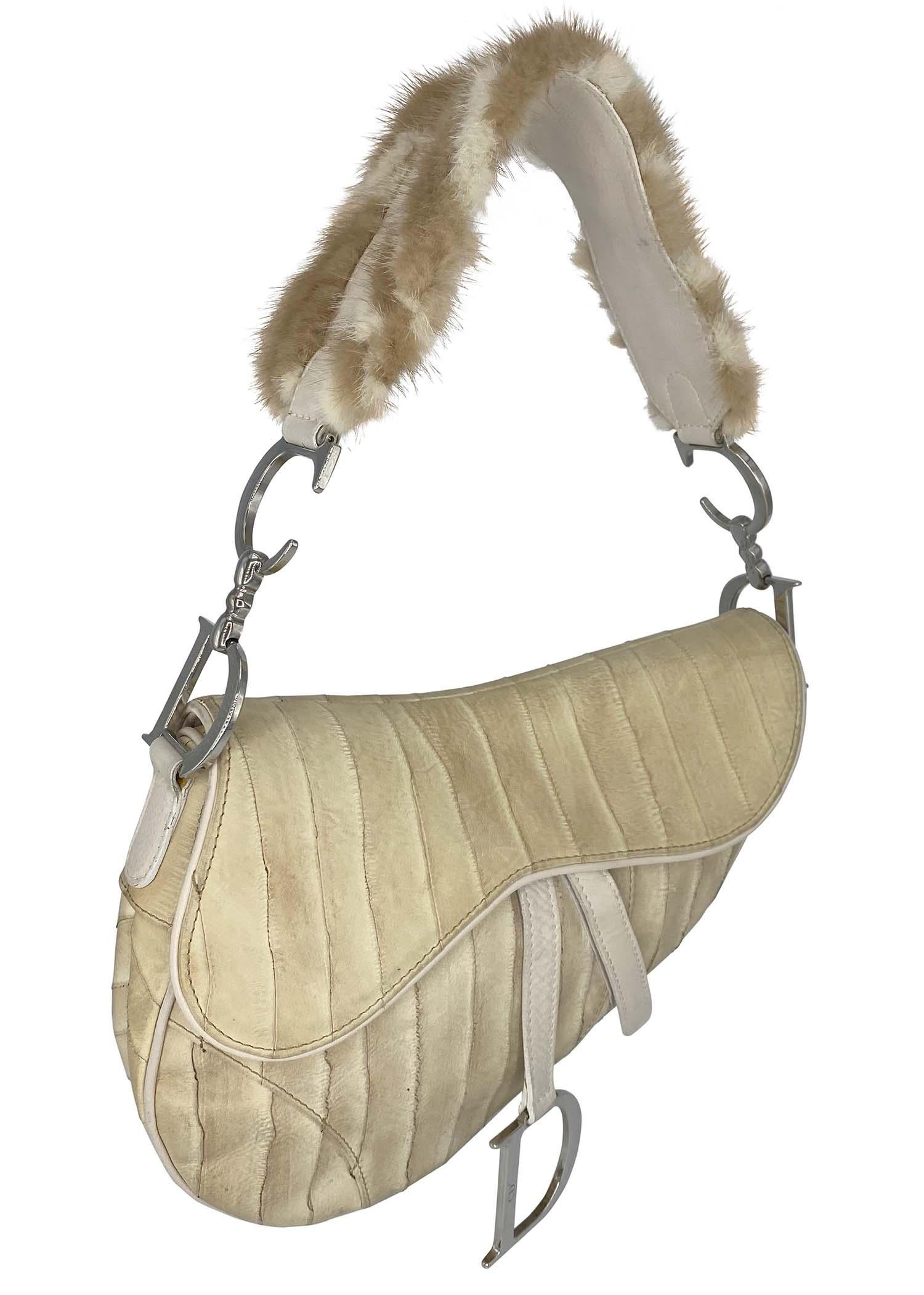 TheRealList presents: a rare, limited edition saddle bag constructed of eel skin, calf skin, and mink fur designed by John Galliano for Christian Dior's Fall/Winter 2004 collection. The saddle bag first debuted in 1999 for Dior's Spring/Summer 2000