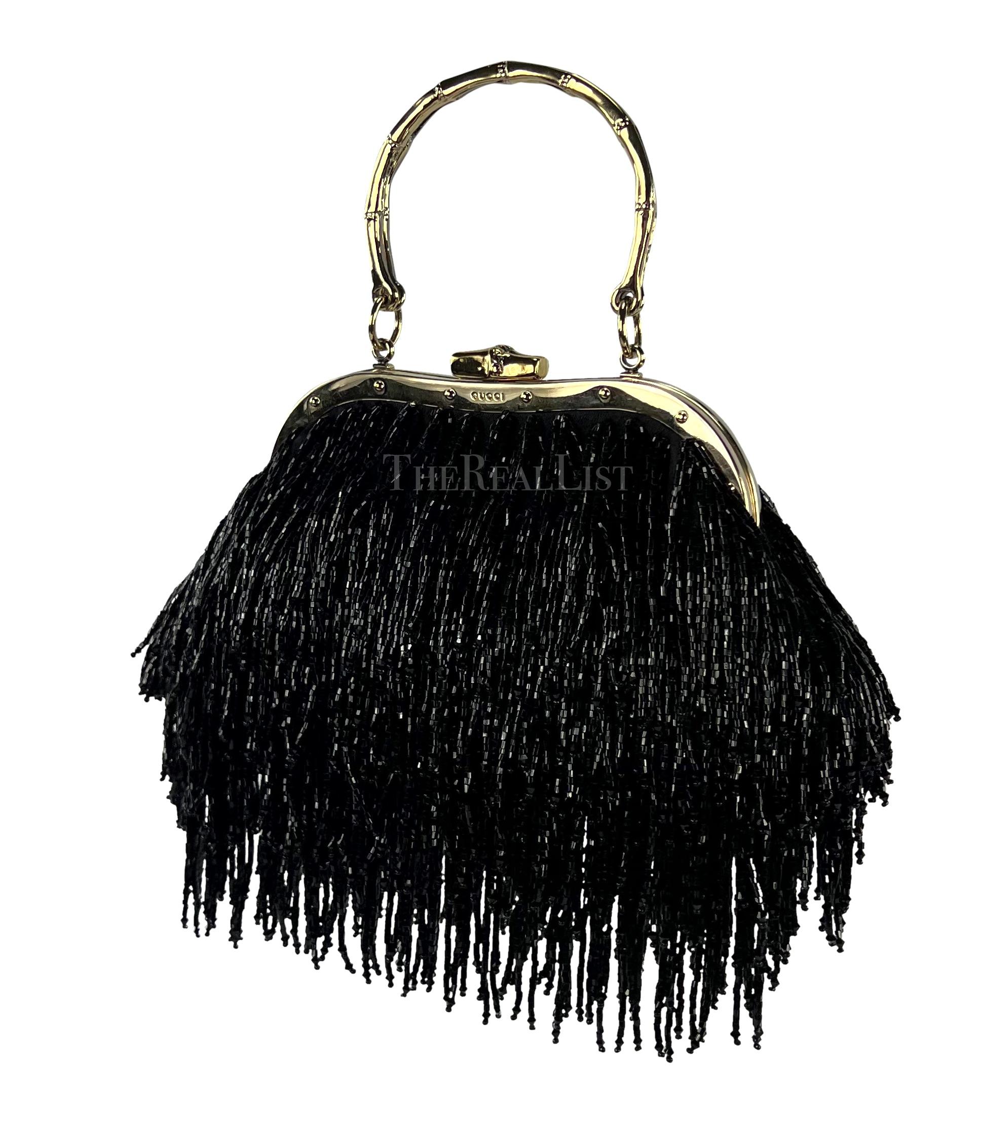 Presenting an incredible black beaded fringe Gucci mini bag, designed by Tom Ford. Step into the realm of pure glamour with this extraordinary black beaded fringe Gucci mini bag, a masterpiece by the legendary Tom Ford. Introduced in the Fall/Winter