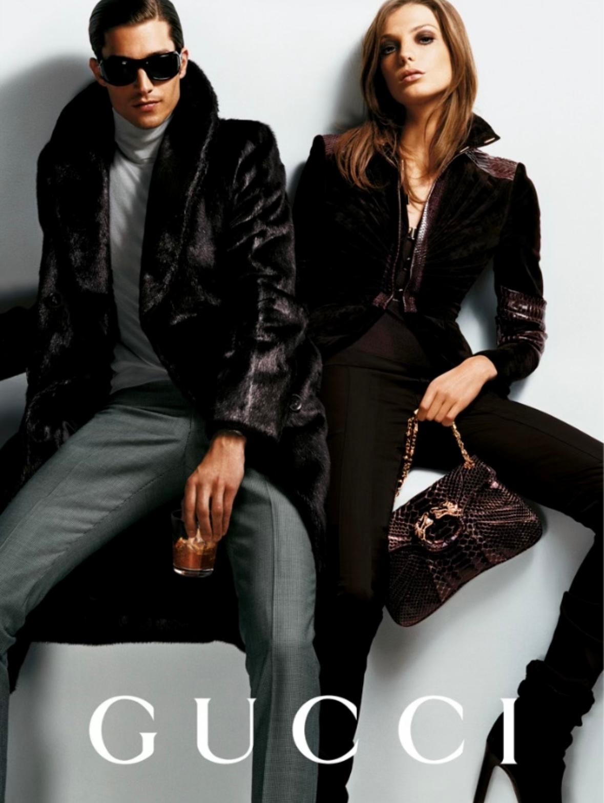 Designed by Tom Ford for his final collection as Gucci's creative director, this black python flap bag from the Fall/Winter 2004 collection is an ultra-luxurious must-have. A python version in another color way was highlighted in the season's ad