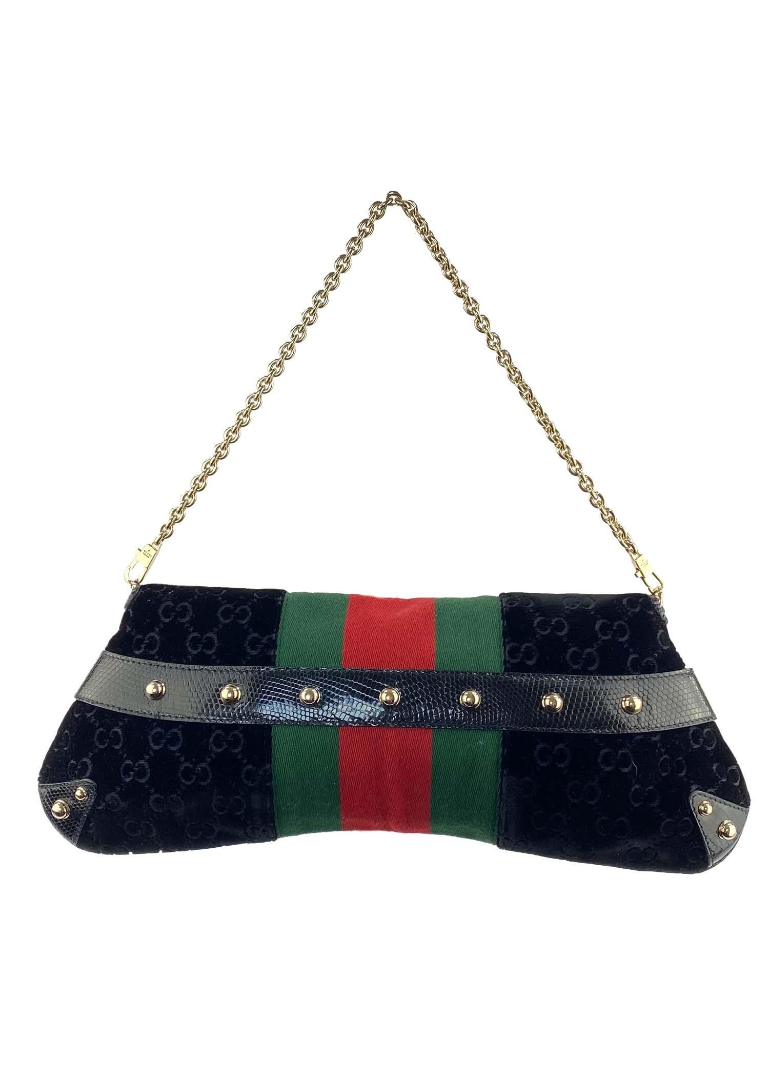 TheRealList presents: Designed by Tom Ford during his tenure at the house of Gucci, this bag represents Tom's interpretation of many of Gucci's classic elements ('GG' print, horse bits, etc.). This large evening convertible bag is constructed of