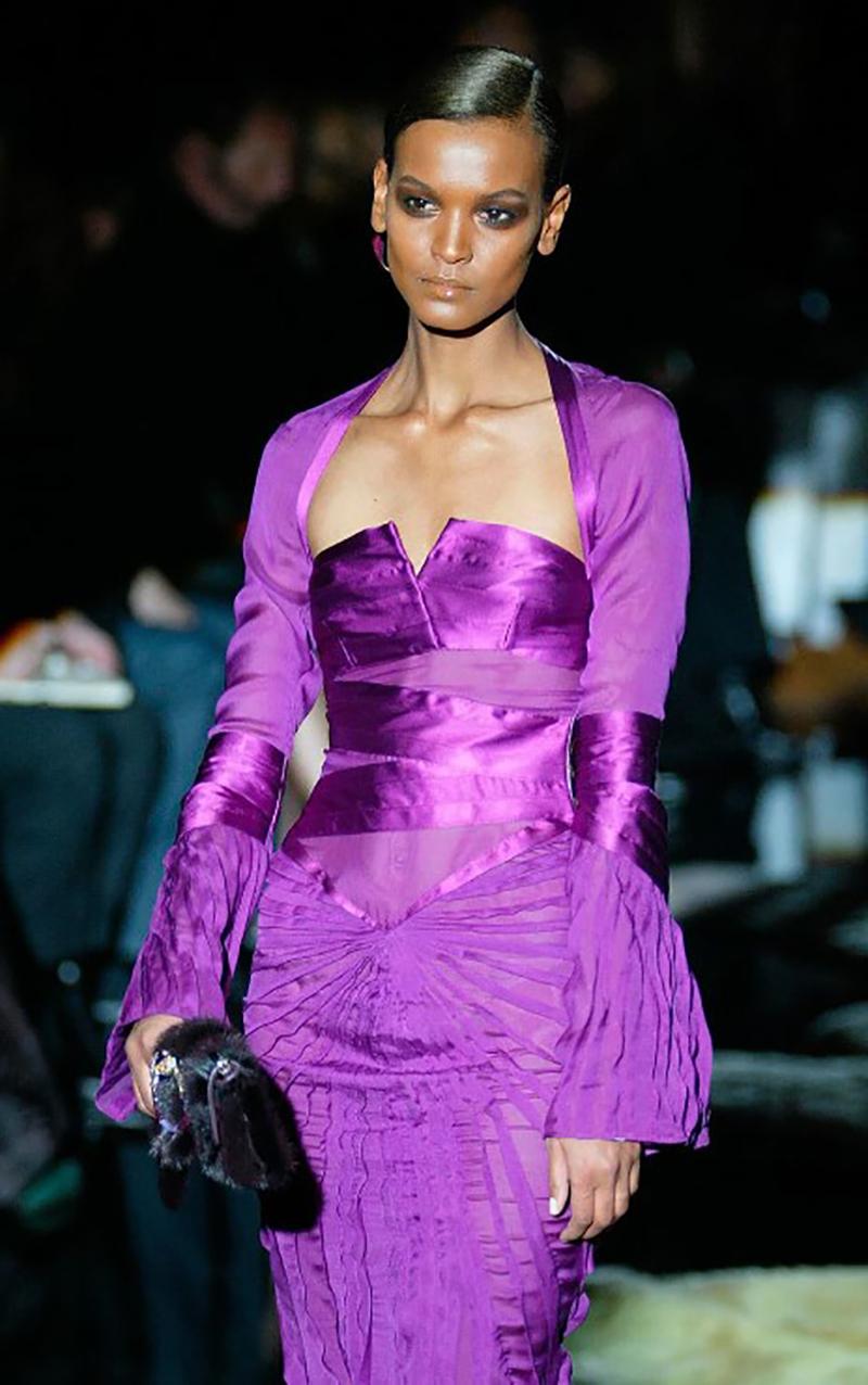 GUCCI SILK DRESS

Designed by Tom Ford for his final GUCCI F/W 2004 ready-to-wear collection.
Look #27

The most seductive and romantic dress ever!
Silk dress adorned with pleated detailing and a concealed zipper closure modeled by Liya Kebede in
