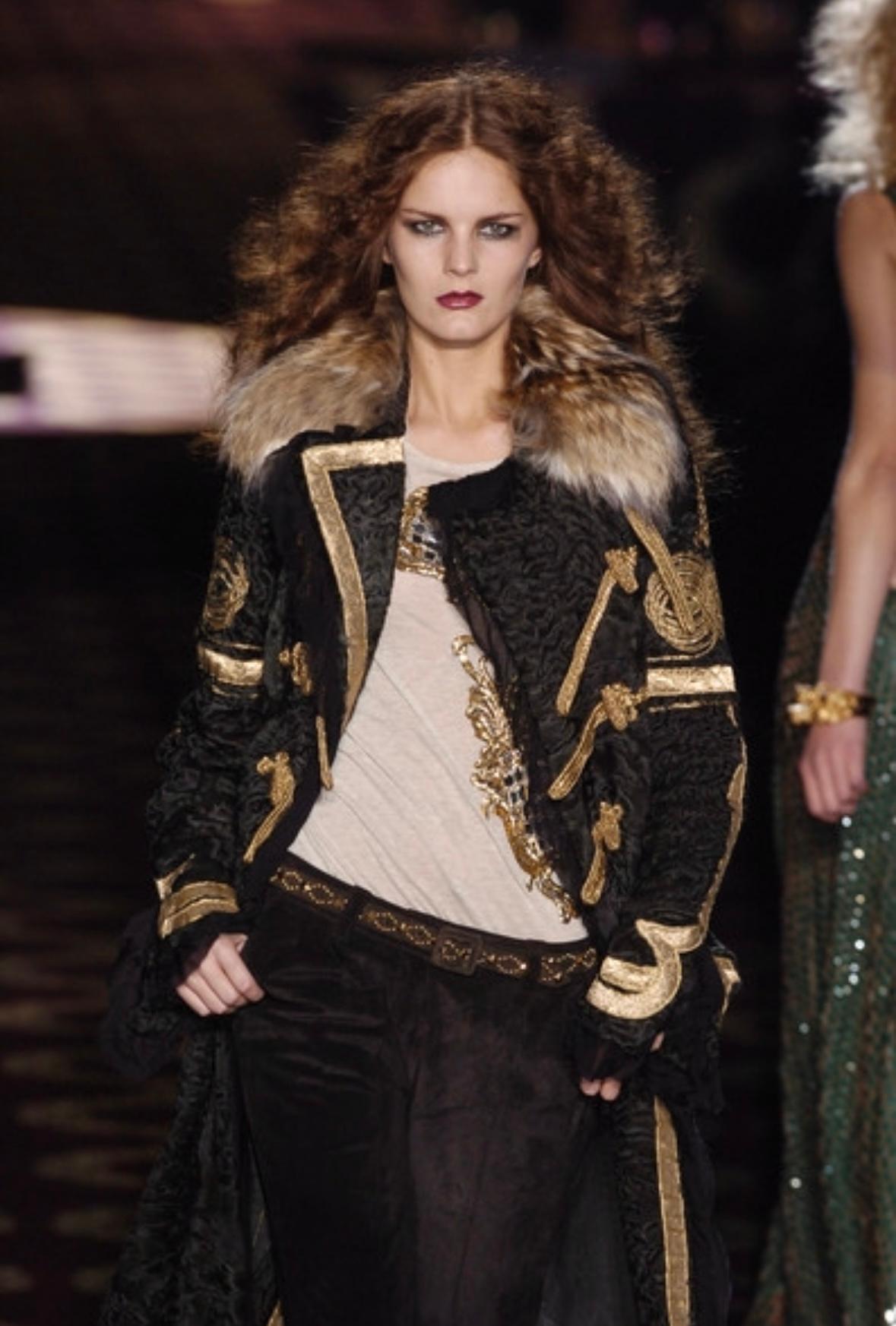 Presenting the most incredible deep purple Persian lamb fur Roberto Cavalli duffle coat. From the Fall/Winter 2004 collection, this coat debuted on the season's runway in dark green as part of look 24 modeled by Marcelle Bittar. This fabulous coat