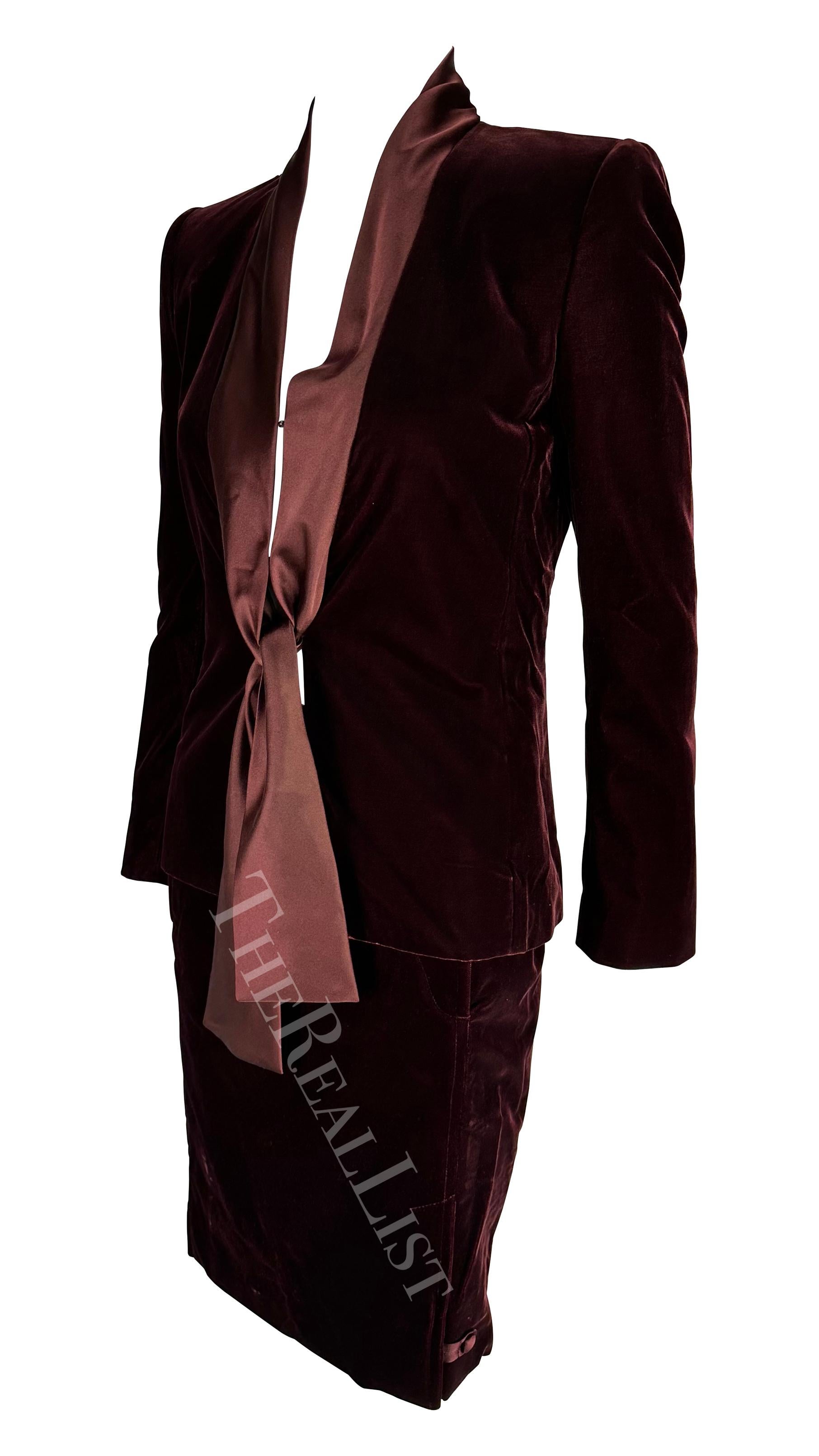 Presenting a beautiful deep red Yves Saint Laurent Rive Gauche velvet skirt suit, designed by Tom Ford. From the Fall/Winter 2004 collection, this two-piece set is comprised of a fitted jacket and matching pencil skirt. The jacket is made complete