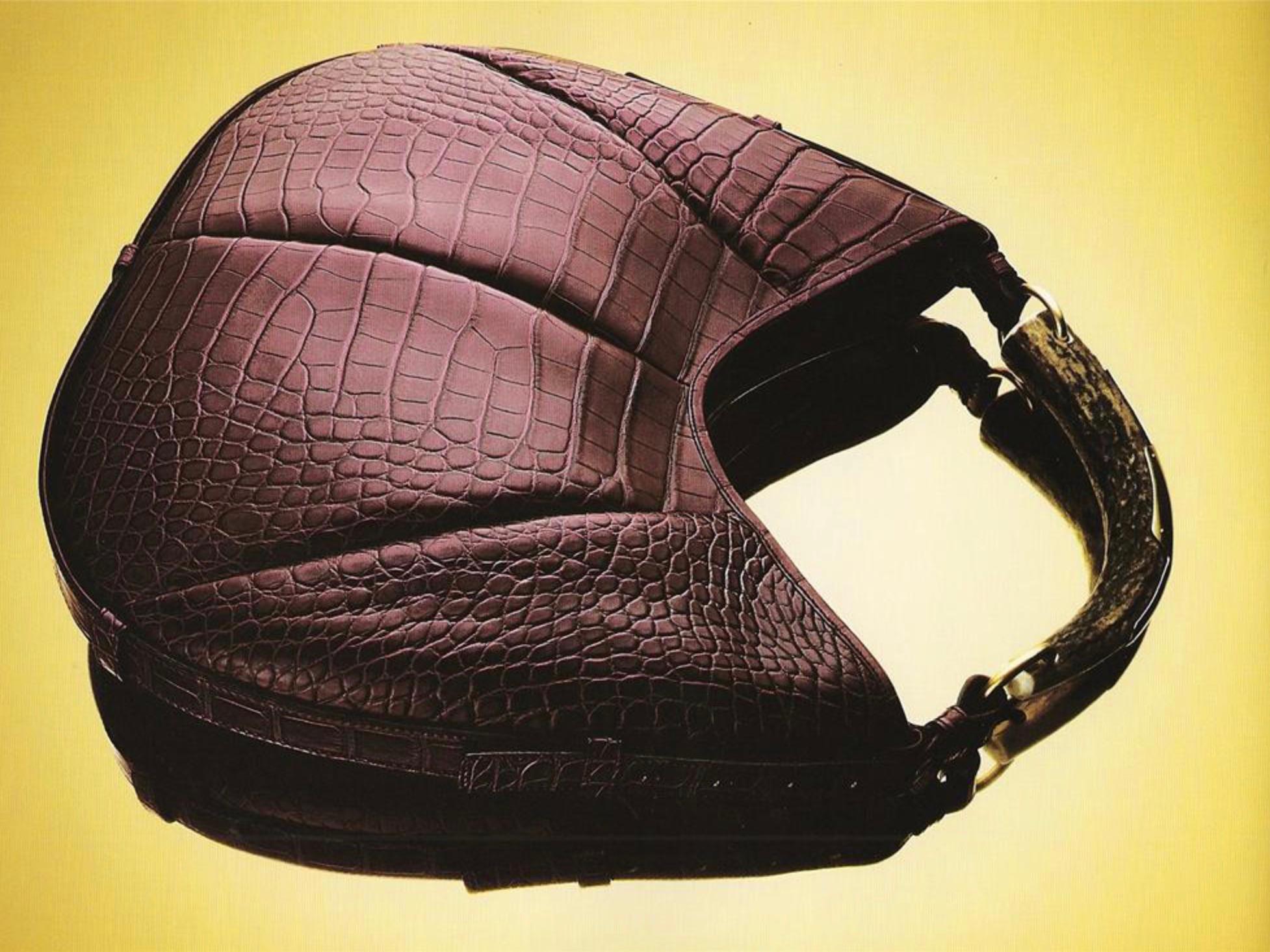 Presenting a fabulous dark taupe alligator leather Yves Saint Laurent Rive Gauche Mombasa style shoulder bag. Originally introduced under the creative direction of Tom Ford, this extra-large genuine alligator skin edition was designed by Stefano