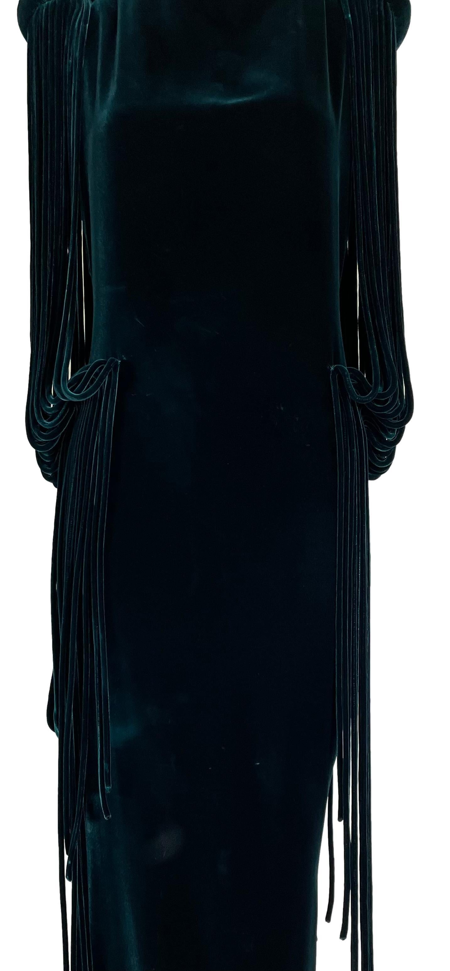 **THANK YOU FOR SHOPPING WITH MES DEUX FILLES**

DESIGNER: F/W 2007 Jean Paul Gaultier Haute Couture Runway-  the dress on the runway had cuffs that attached to the fringe pieces as sleeves but this dress is sleeveless and just has the long fringe