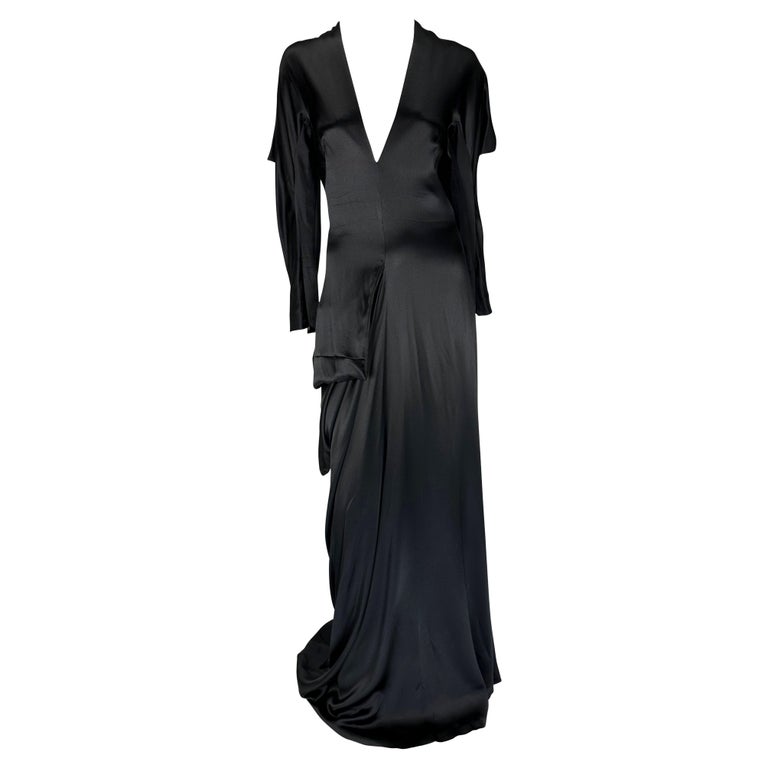 TheRealList presents: an incredible black silk satin Alexander McQueen gown. From the Fall/Winter 2010 