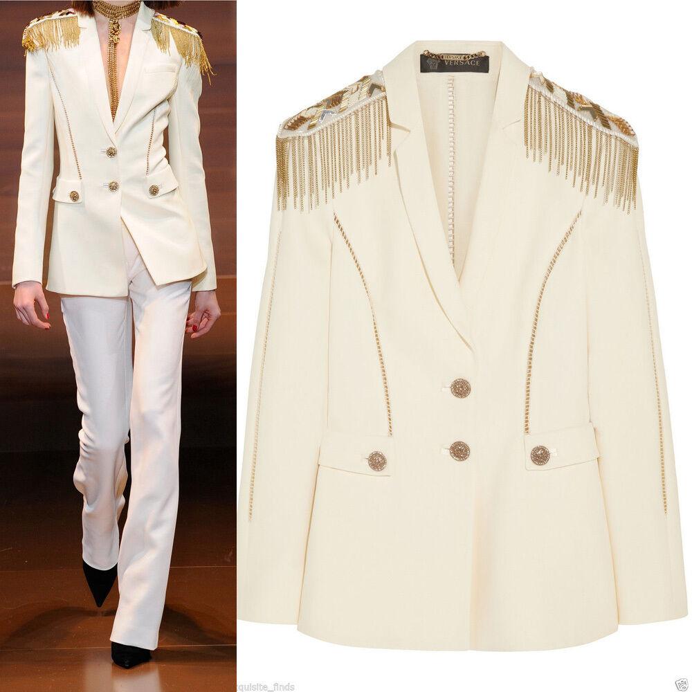 VERSACE  

Actual runway sample Fall/Winter 2014 Look # 47 
Off-white silk-crepe blazer

as seen on Jen!


Versace's off-white silk-crepe blazer typifies the label's more-is-more mantra. 

The padded shoulders have gold chain embellishments that