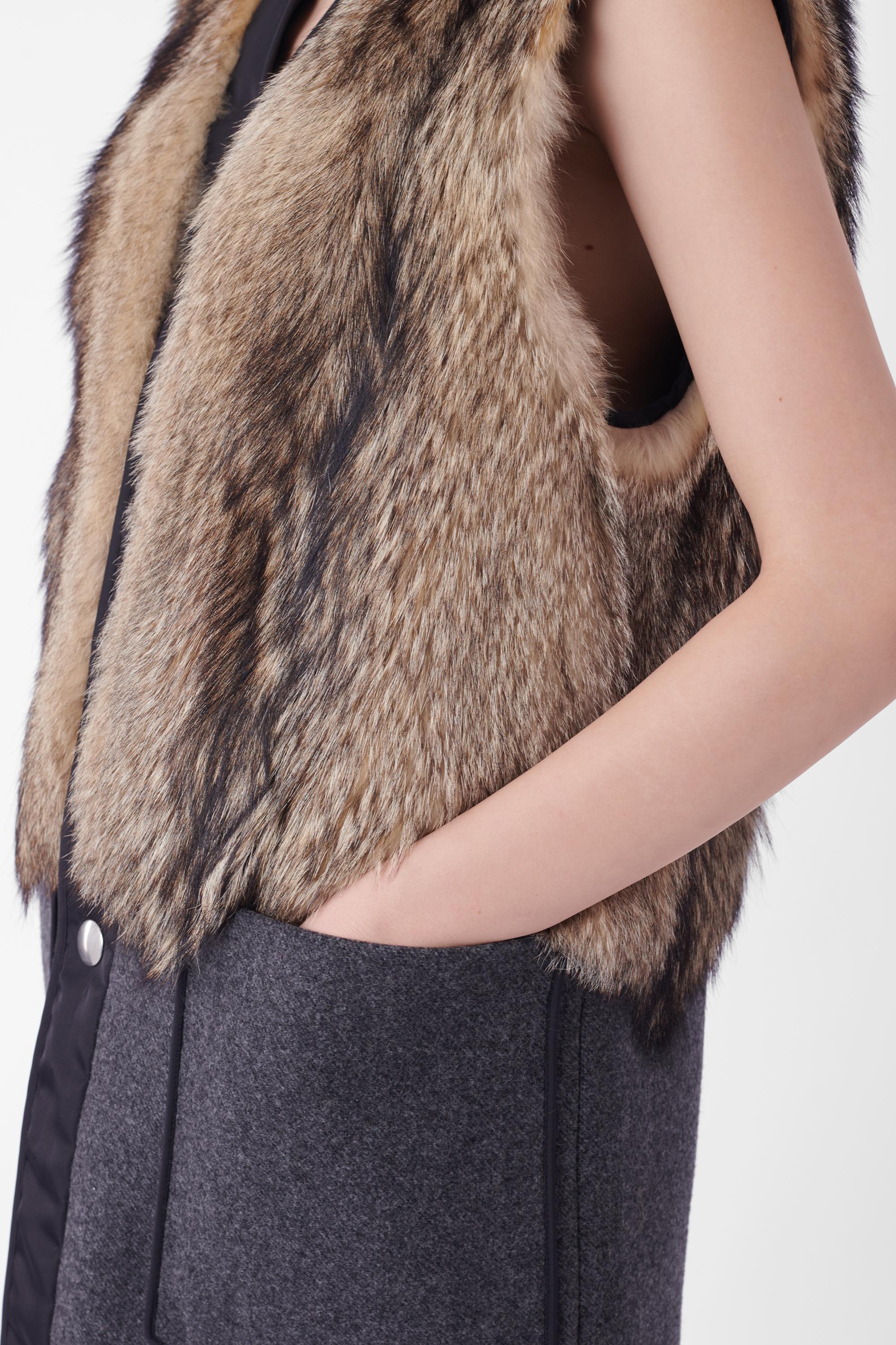 Prada Fall Winter 2014 runway mens fur long waistcoat. Features fur upper half, wool lower half with nylon interior lining, double front pockets and button front closure. In excellent condition, brand new with tags.

Brand: Prada
Size: UK 8
Color: