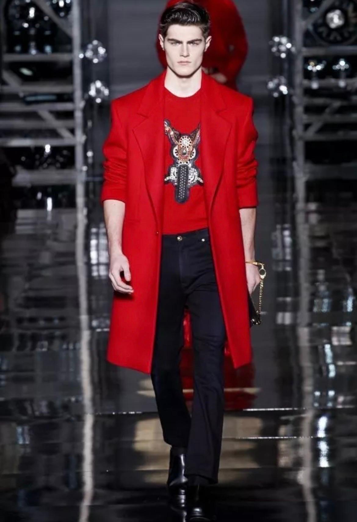 VERSACE
Actual runway sample Fall/Winter 2014 look # 11
Bring a touch of luxury to your wardrobe with VERSACE's embellished motorcycle sweater.
Embellishmets
Color: Red
Long sleeves 
Content: 100% cashmere
IT Size is 48 - US 38
Made in Italy
Brand