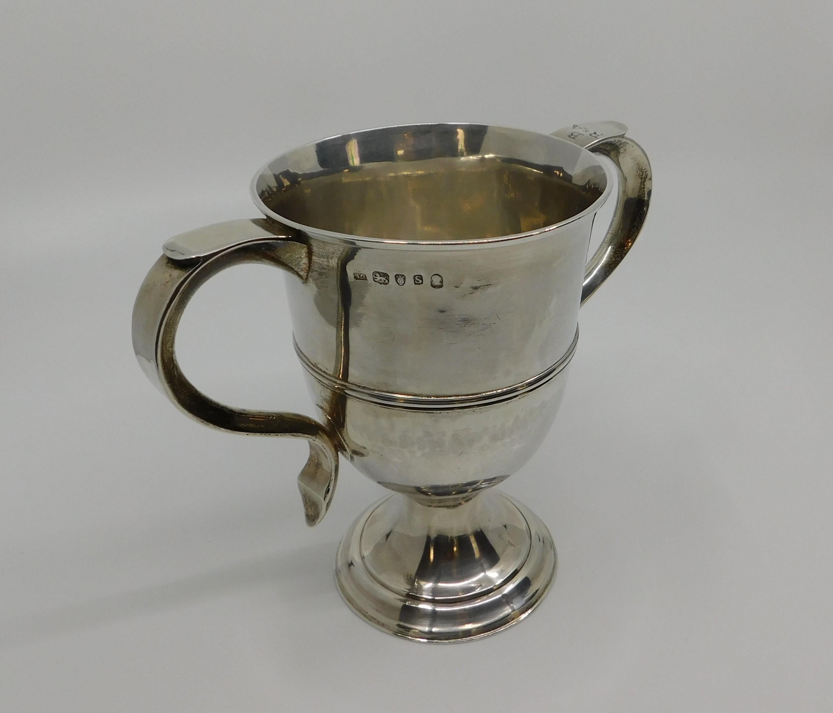 Double handle sterling silver English cup, circa 1813. Unknown maker mark.
