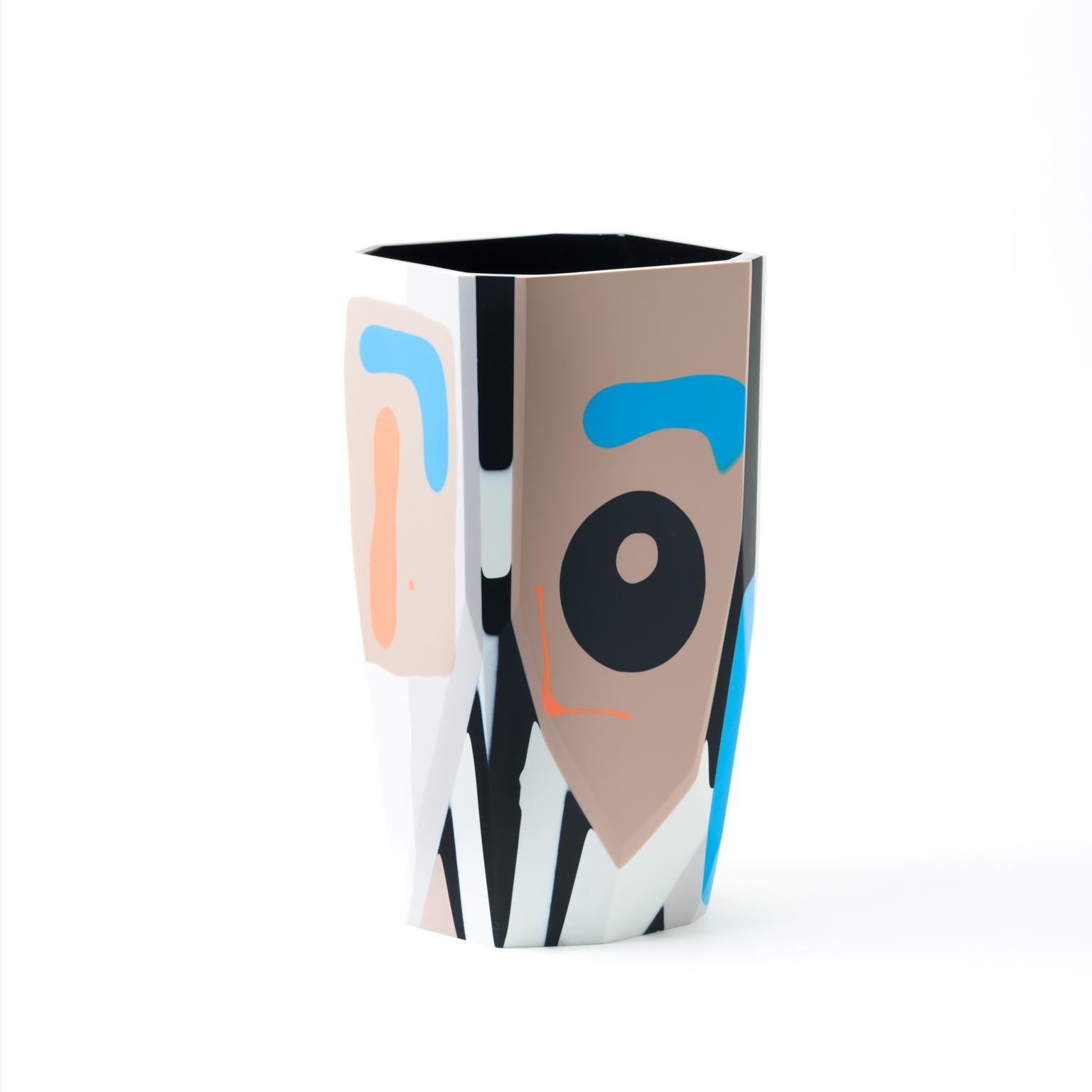 The graphic and bold Kalahari vase is a new addition to our Black Magic collection of resin vessels, inspired by the concept of revealing that which has been hidden from sight, but remains ever-present.

Gazing toward the past, to cultures and