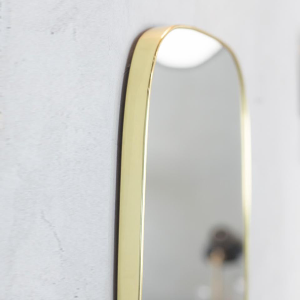Beautiful wall mirror with brass frame from Italy.
Mid-Century Modern design.