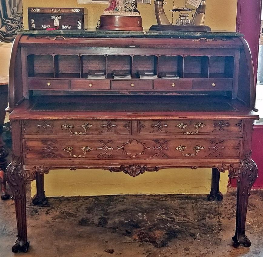Presenting an absolutely gorgeous mid-late 19th century British Chinese Chippendale style cylinder desk from the renowned maker of Hampton & Sons, of Pall Mall, London.
This stunning piece is elegant simplicity at it’s best with the most gorgeous