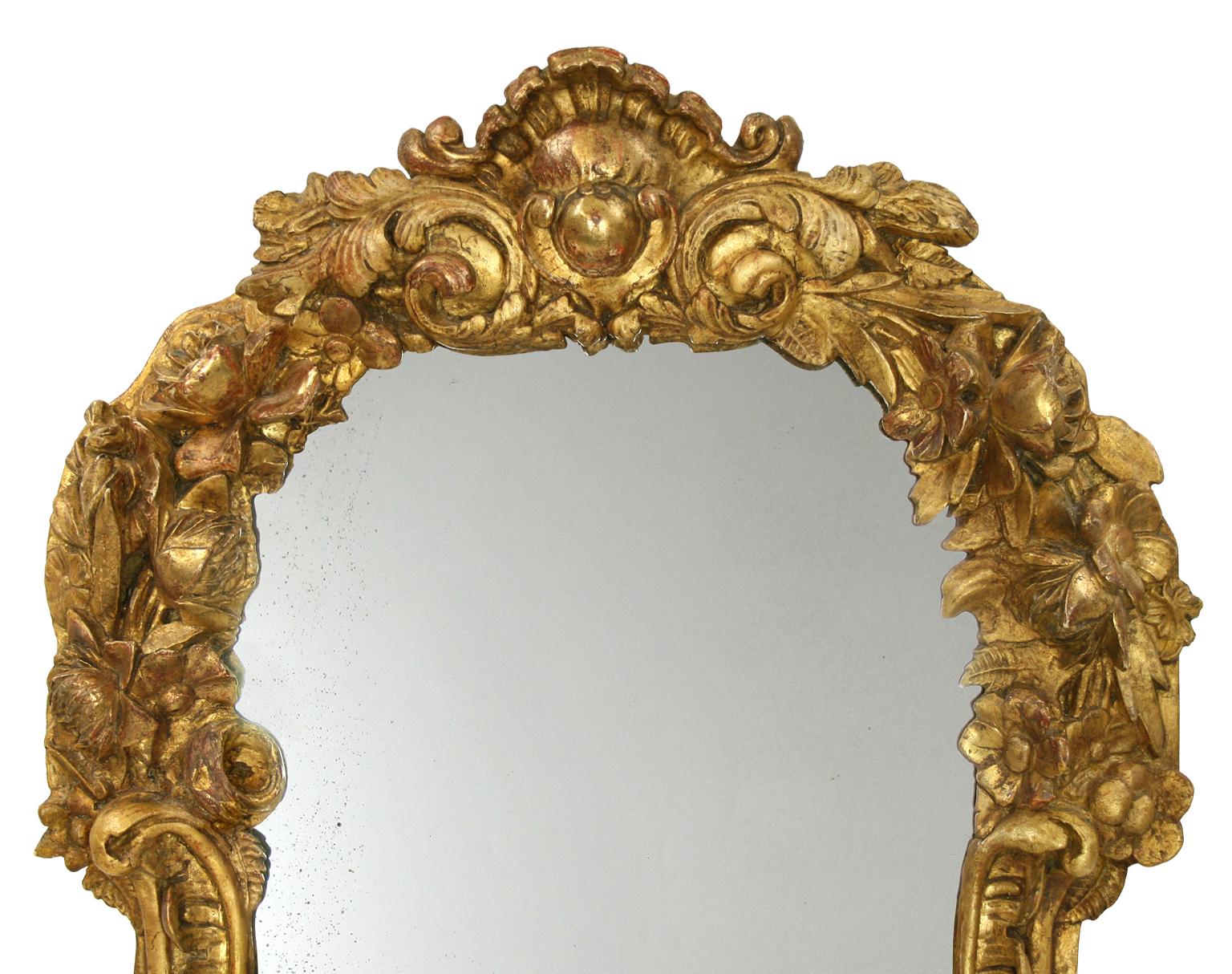 Rare French antique giltwood mirror, wedding mirror late 19th century. Carved wood, composition garlands of flowers, gilded in fine gold (Original gilding). Antique wood back. Silver antique glass mirror. Measures: Antique frame width: 5.5 / 10 cm.