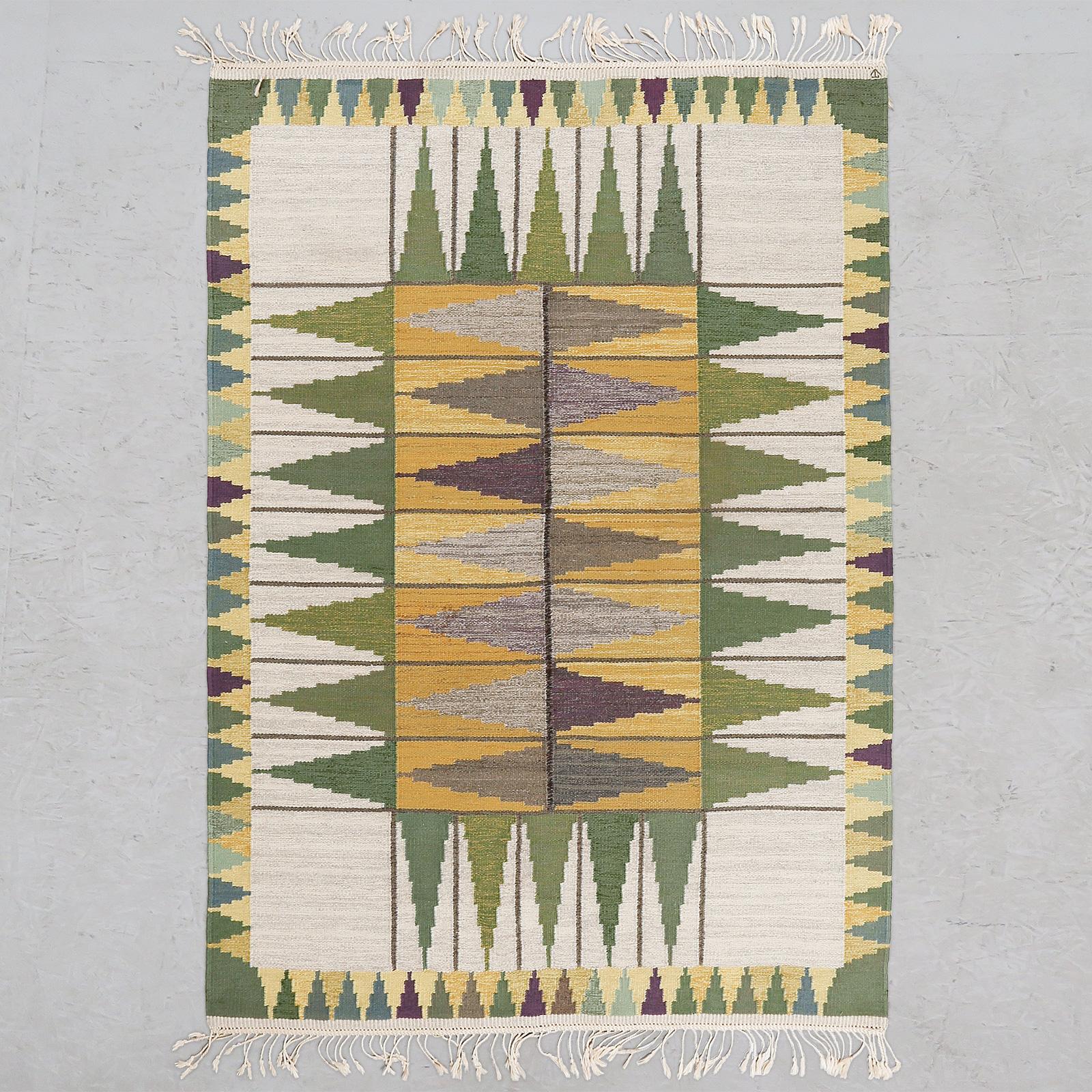 Wonderful, vintage Swedish flat-weave rug with geometric compositions in shades of green, beige and yellow. Signed TV.
