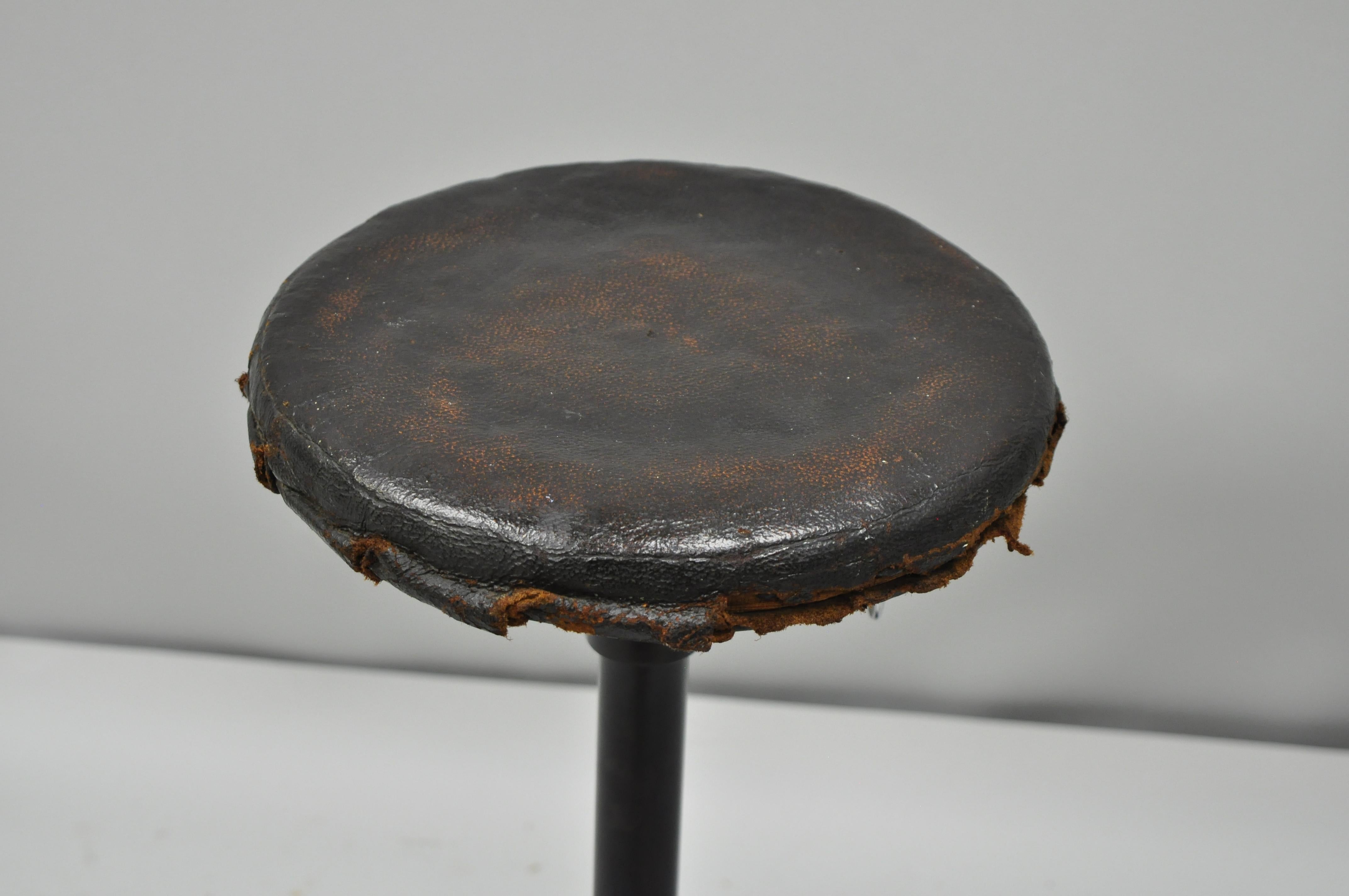 Articulating Industrial Modern Brown Leather Adjustable Work Stool by Peerless In Good Condition For Sale In Philadelphia, PA