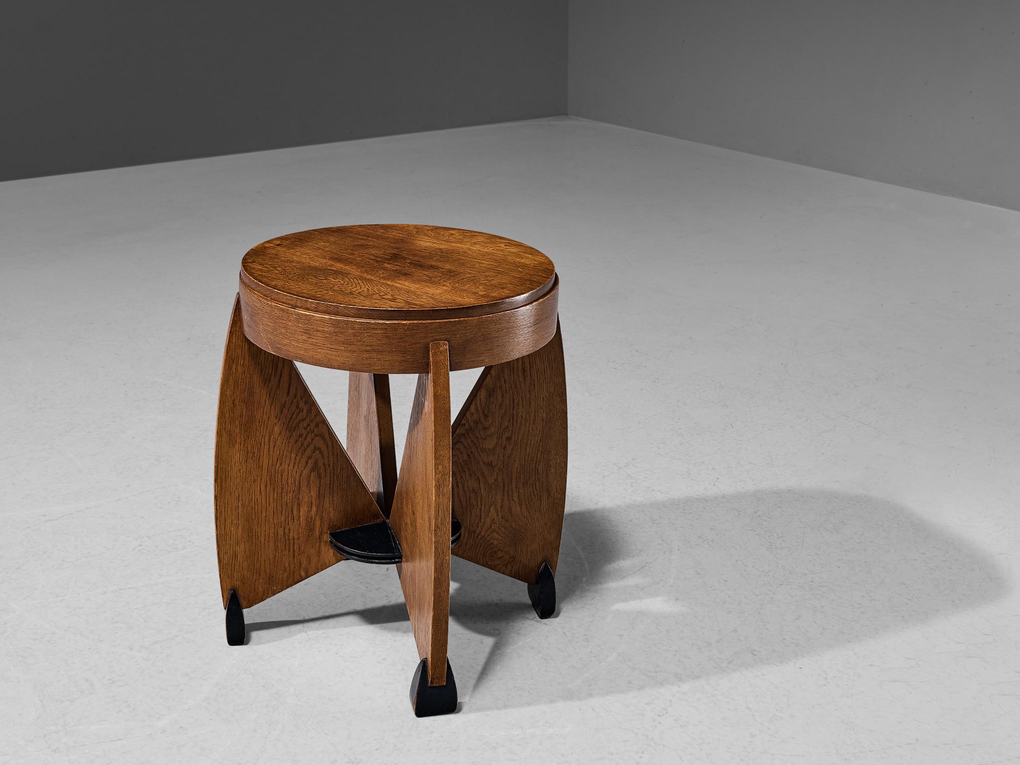 Fa. J.J. Zijfers & Co, side table, oak, Netherlands, ca. 1925

Charming Amsterdam School side table manufactured by Fa. J.J. Zijfers & Co. in the 1920s in the Netherlands. This table is executed in a natural and black stained oak. The design of