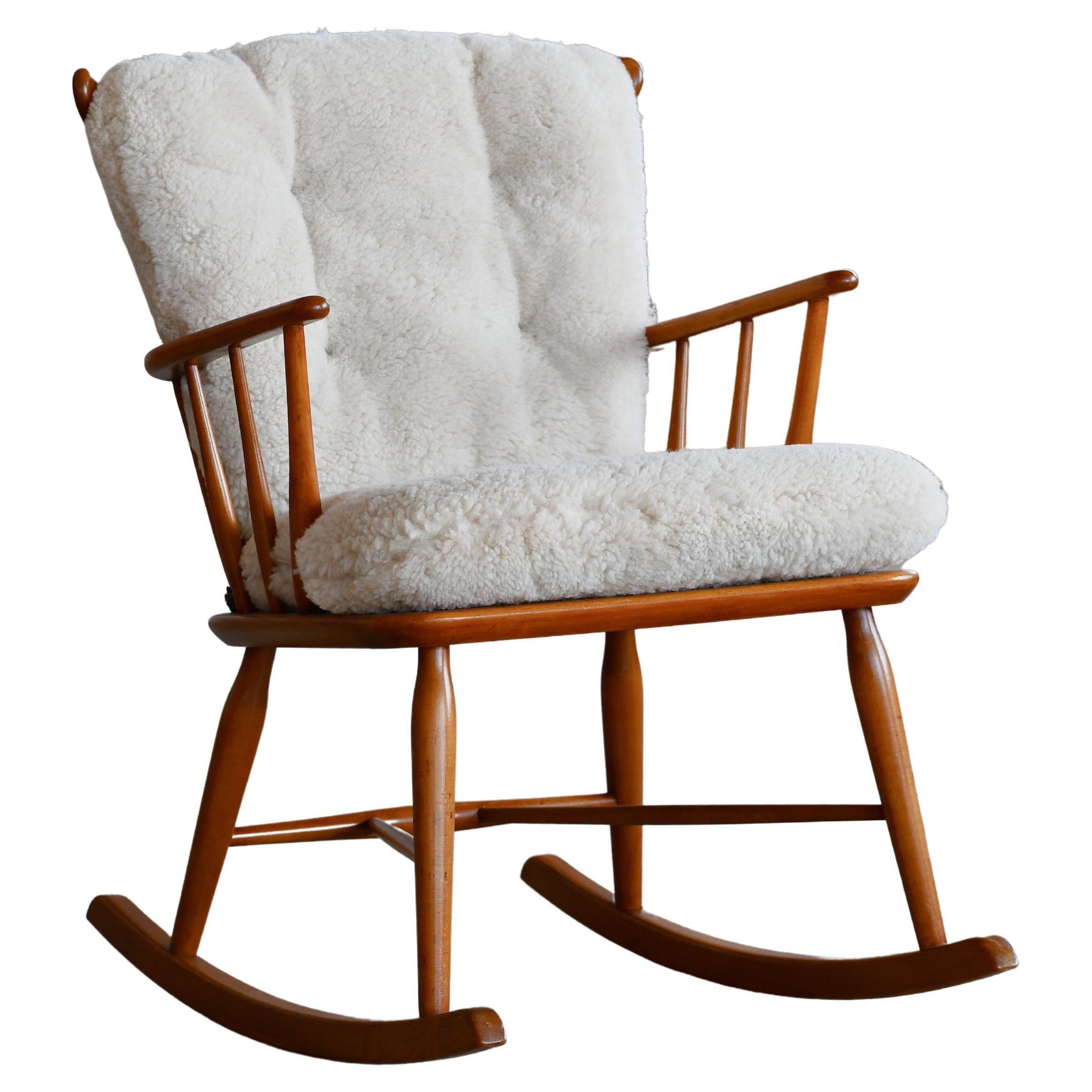 MidCentury Spindle Back Rocking Chair For Sale at 1stDibs