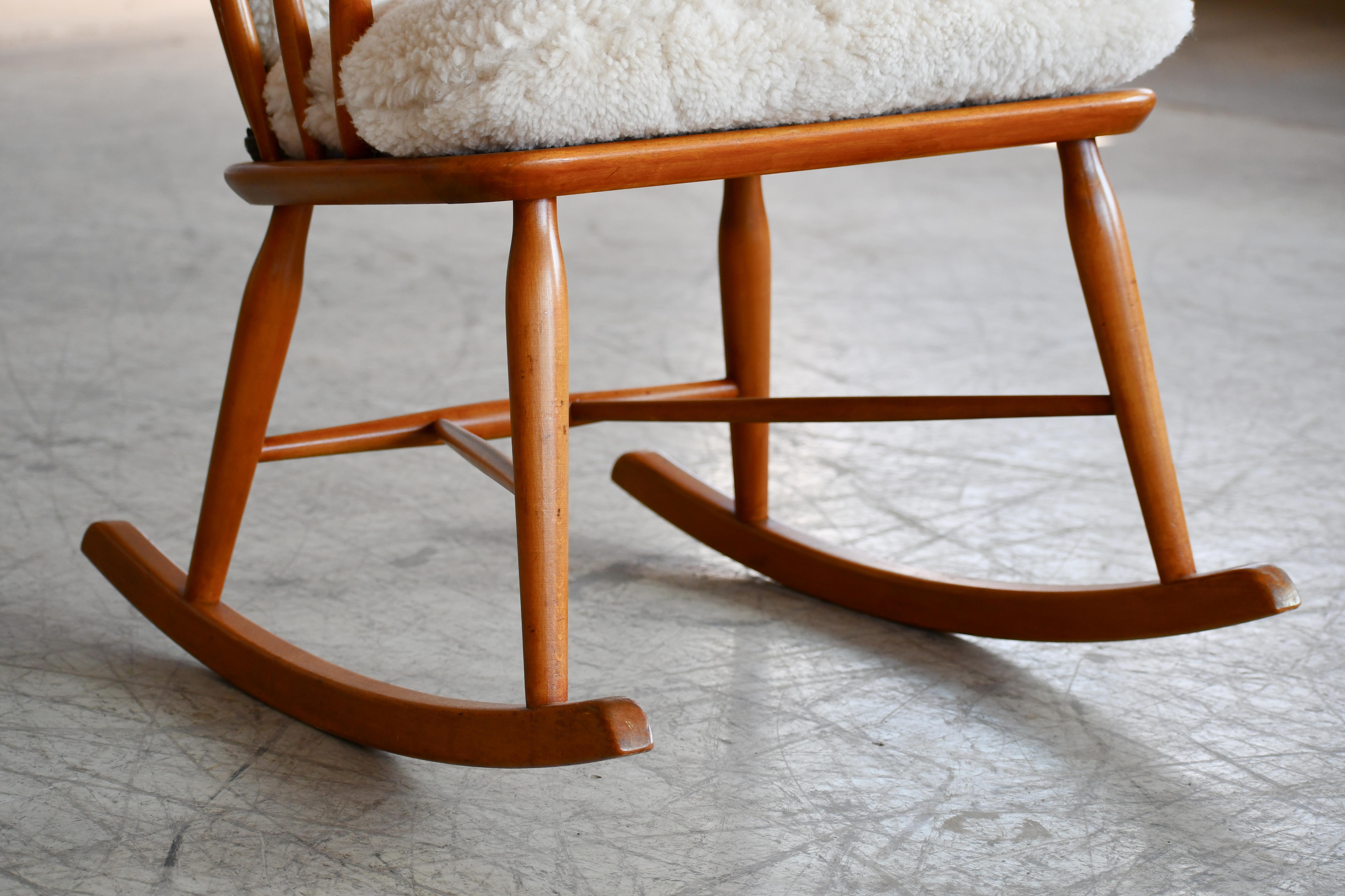 Danish Faarstrup 1950 Low Spindle Back Rocking Chair with Shearling Cushions