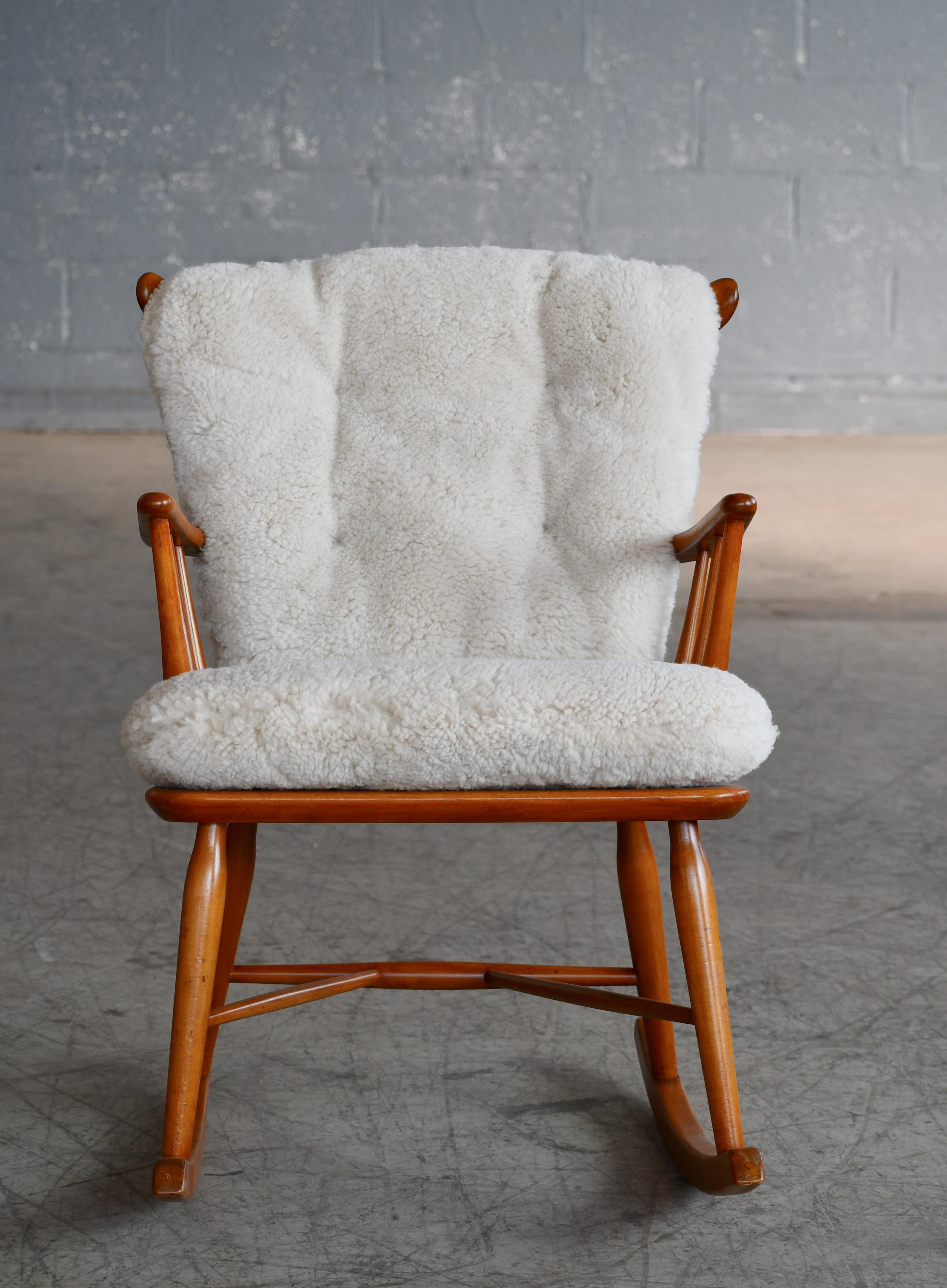 Mid-20th Century Faarstrup 1950 Low Spindle Back Rocking Chair with Shearling Cushions