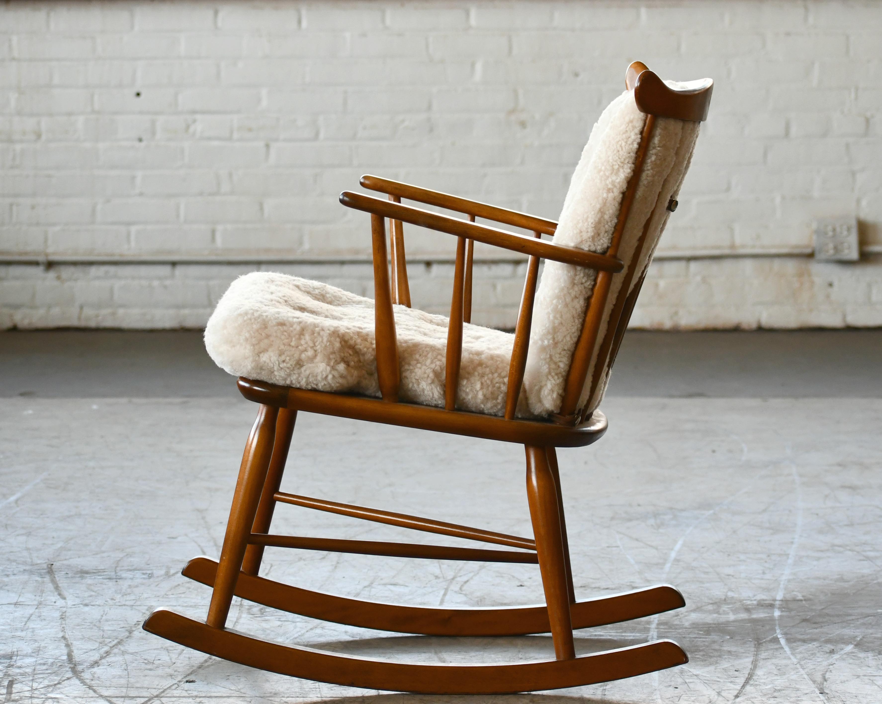 Danish Faarstrup 1950 Low Spindle Back Rocking Chair with Shearling Cushions