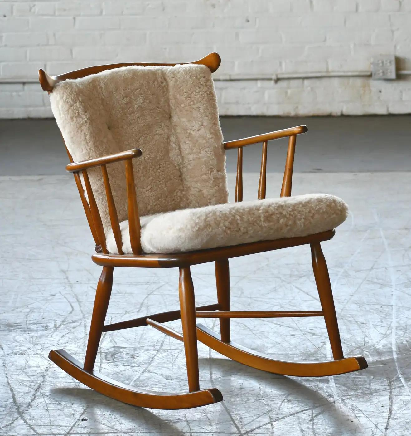 Teak Faarstrup 1950 Low Spindle Back Rocking Chair with Shearling Cushions