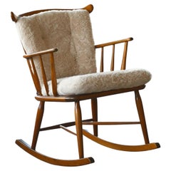Faarstrup 1950 Low Spindle Back Rocking Chair with Shearling Cushions