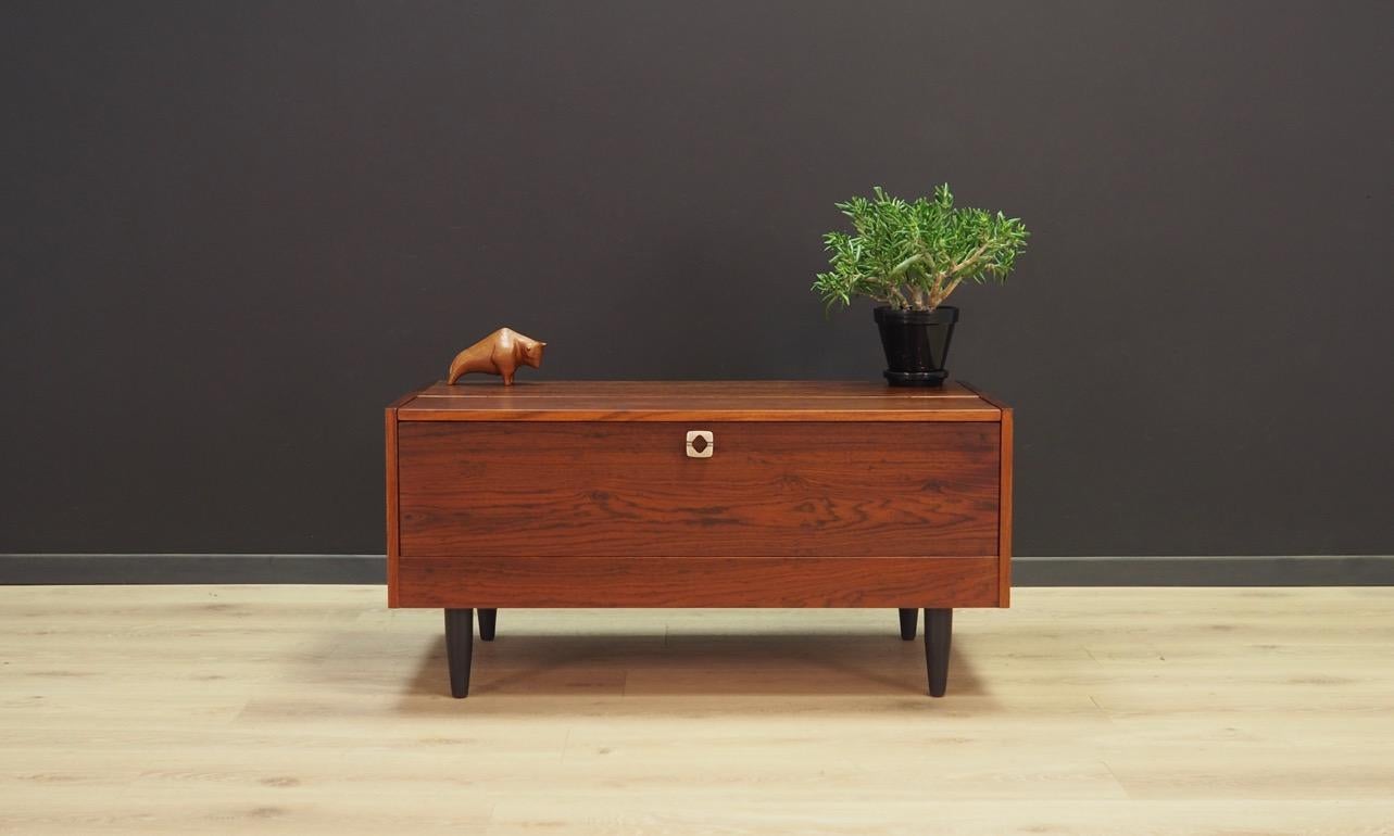 Remarkable cabinet from the 1960s-1970s, a minimalistic form produced in the Faarup manufacture. Finished with rosewood veneer. Roomy space behind the doors. Preserved in good condition (small dings, scratches) - directly for use.

Dimensions: