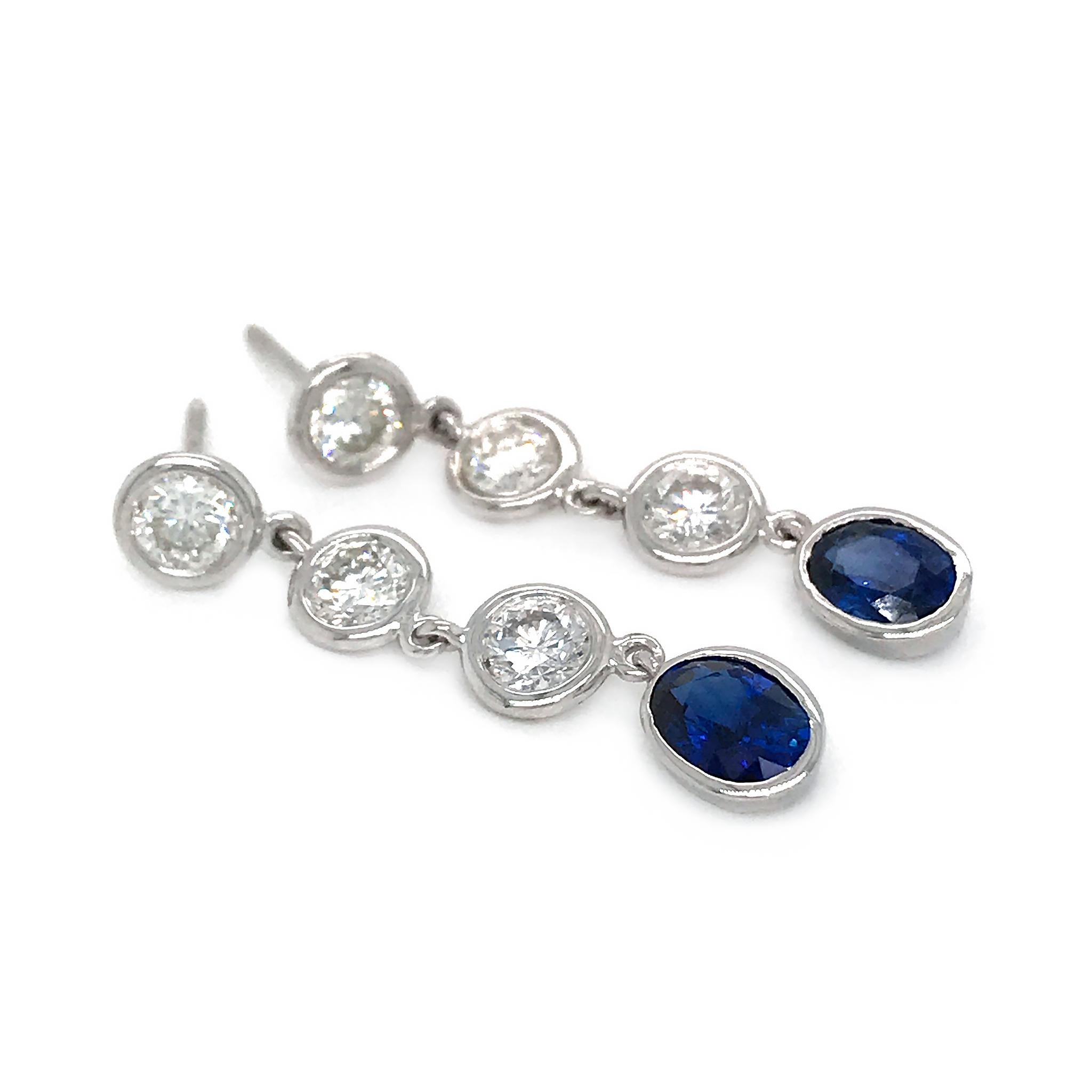 14k White Gold
Diamond: 1.88 ct twd 
Sapphire: 2.10 ct twd 
Total Weight: 3.4 grams
Length: 1.30 inches