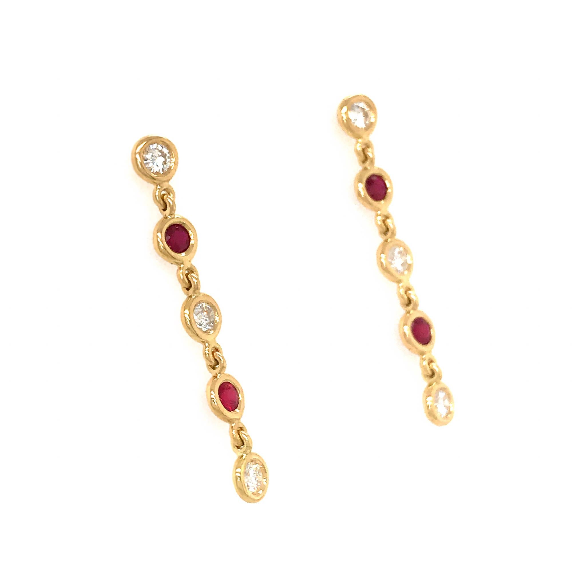 METAL TYPE: 18k Yellow Gold
STONE WEIGHT: RUBY = 0.53ct twd 
                             DIAMOND = 0.62ct twd
TOTAL WEIGHT: 3.4 grams
EARRINGS LENGTH: 1.5 inches