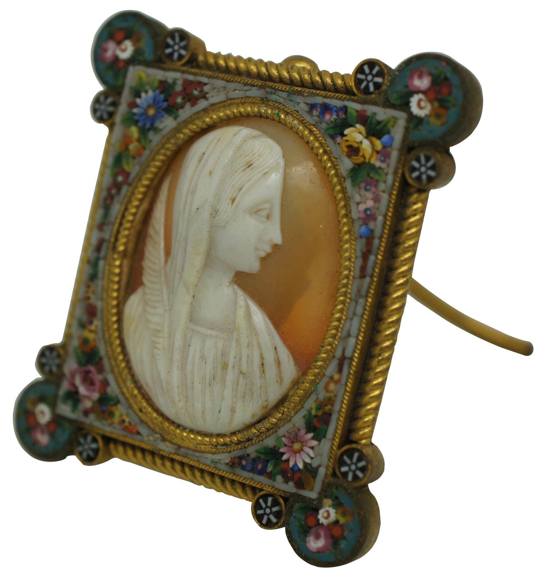 Fabbrica Angelo Pessar Exquisite antique floral micro mosaic and gold tone frame marked FAP with a folding kick Stand, surrounding a peachy-orange and white shell cameo featuring a neoclassical veiled woman holding a feather, attributed to the